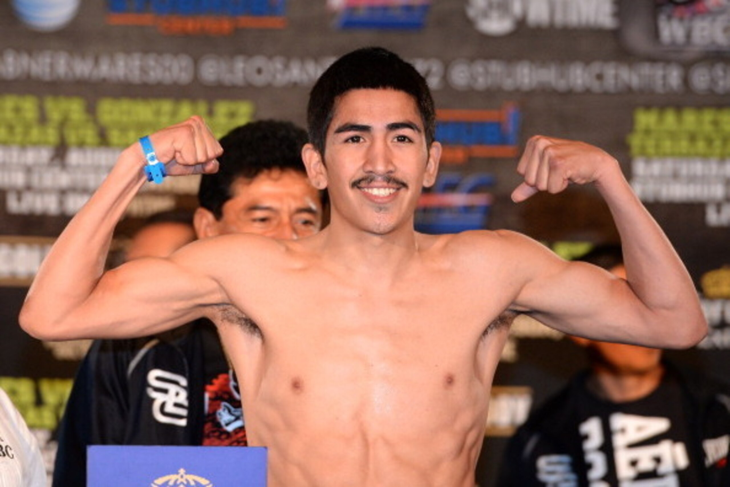 LOS ANGELES, CA - AUGUST 23:  Leo Santa Cruz poses as he steps on the scale at 121.5 pounds before his fight against Victor Terrazas during the weigh in at the Millennium Biltmore Hotel on August 23, 2013 in Los Angeles, California.  (Photo by Harry How/G