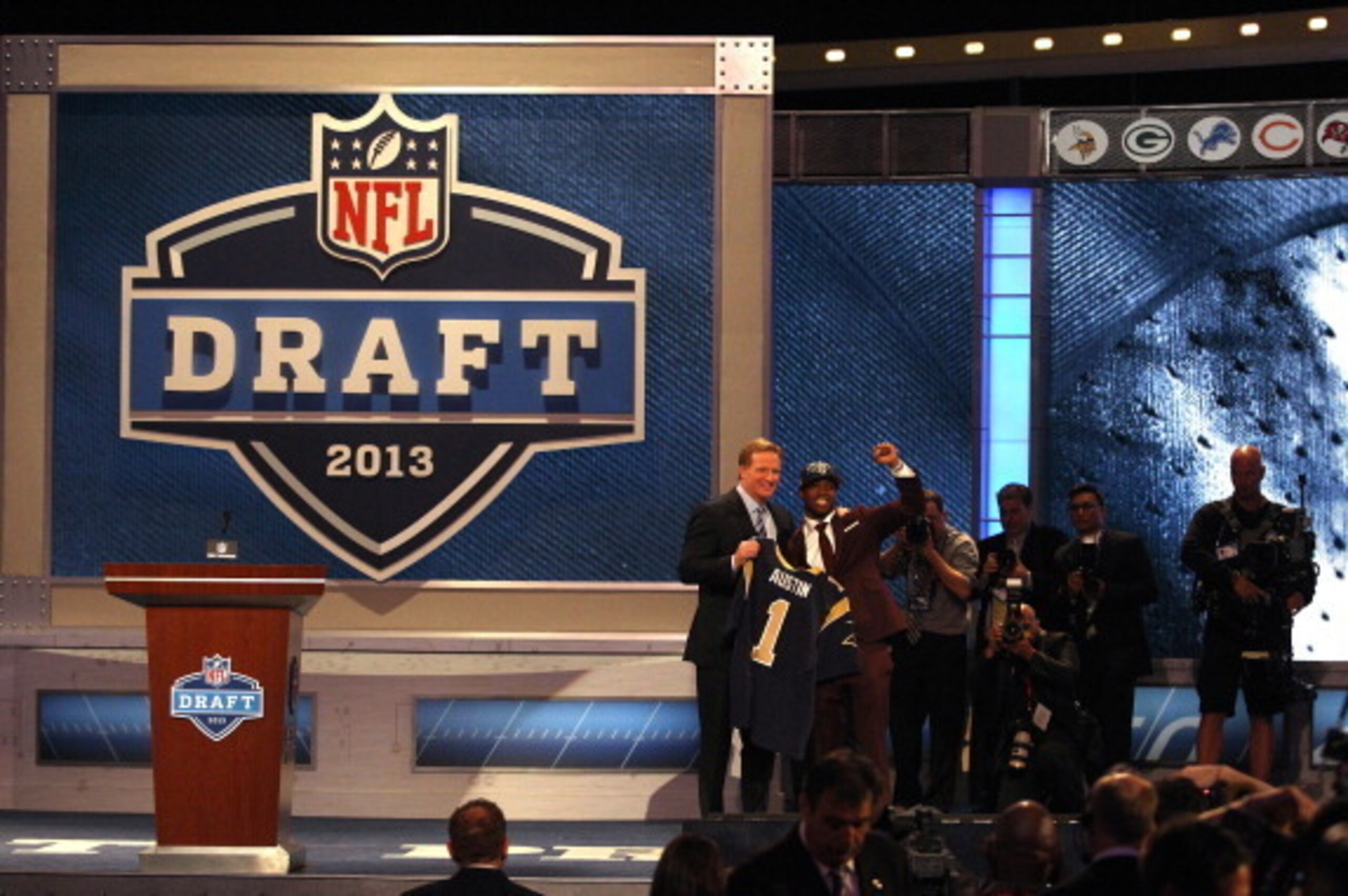 NEW YORK, NY - APRIL 25:  Tavon Austin (R) of West Virginia Mountaineers reacts with NFL Commissioner Roger Goodell as they hold up a jersey on stage after Austin was picked #8 overall by the St. Louis Rams in the first round of the 2013 NFL Draft at Radi