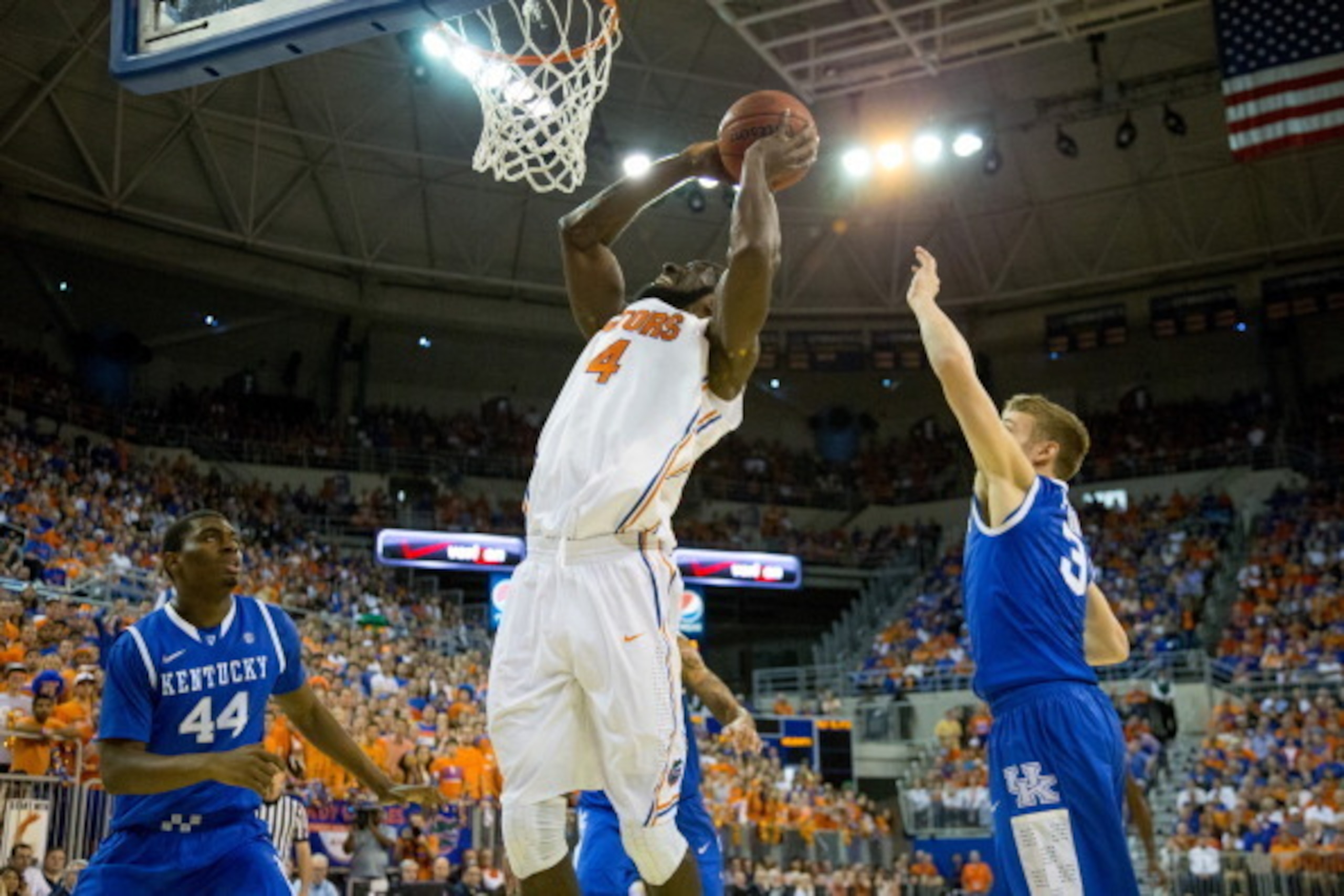 GAINESVILLE, FL - MARCH 08: Patric Young #4 of the Florida Gators dunks the ball during the first half of the game Kentucky Wildcats at the Stephen C. O'Connell Center on March 8, 2014 in Gainesville, Florida. (Photo by Rob Foldy/Getty Images)