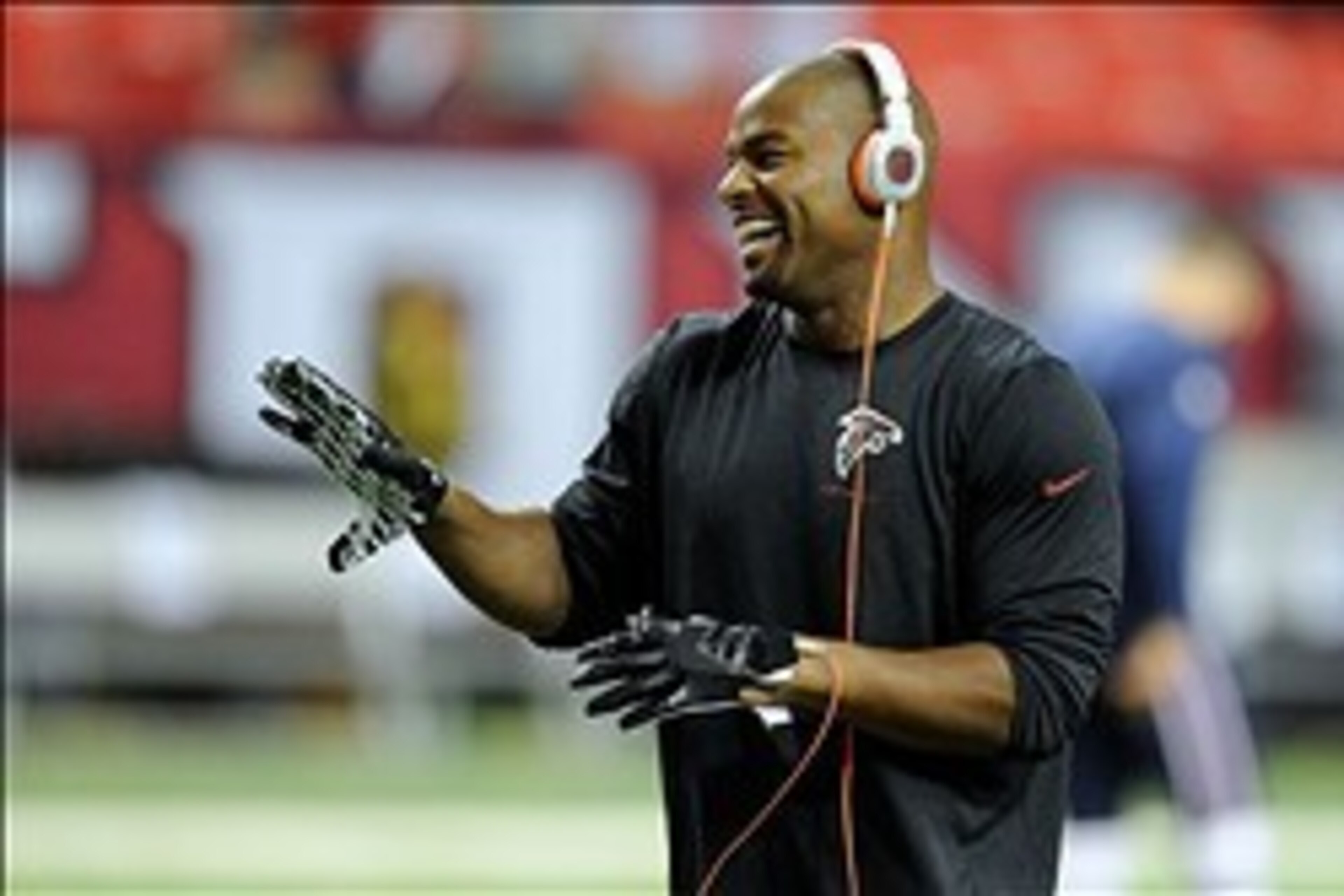 Sep 29, 2013; Atlanta, GA, USA; Atlanta Falcons defensive end Osi Umenyiora (50) has a laugh on the field before the game against the New England Patriots at Georgia Dome. Mandatory Credit: Dale Zanine-USA TODAY Sports Sep 29, 2013; Atlanta, GA, USA; Atlanta Falcons defensive end Osi Umenyiora (50) has a laugh on the field before the game against the New England Patriots at Georgia Dome. Mandatory Credit: Dale Zanine-USA TODAY Sports