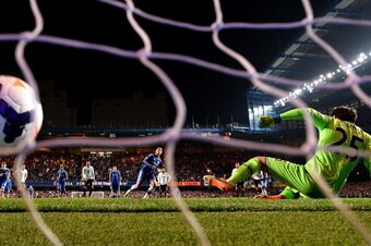 LONDON, ENGLAND - MARCH 08:  Eden Hazard of Chelsea scores his team's second goal from the penalty spot past goalkeeper Hugo Lloris of Spurs during the Barclays Premier League match between Chelsea and Tottenham Hotspur at Stamford Bridge on March 8, 2014