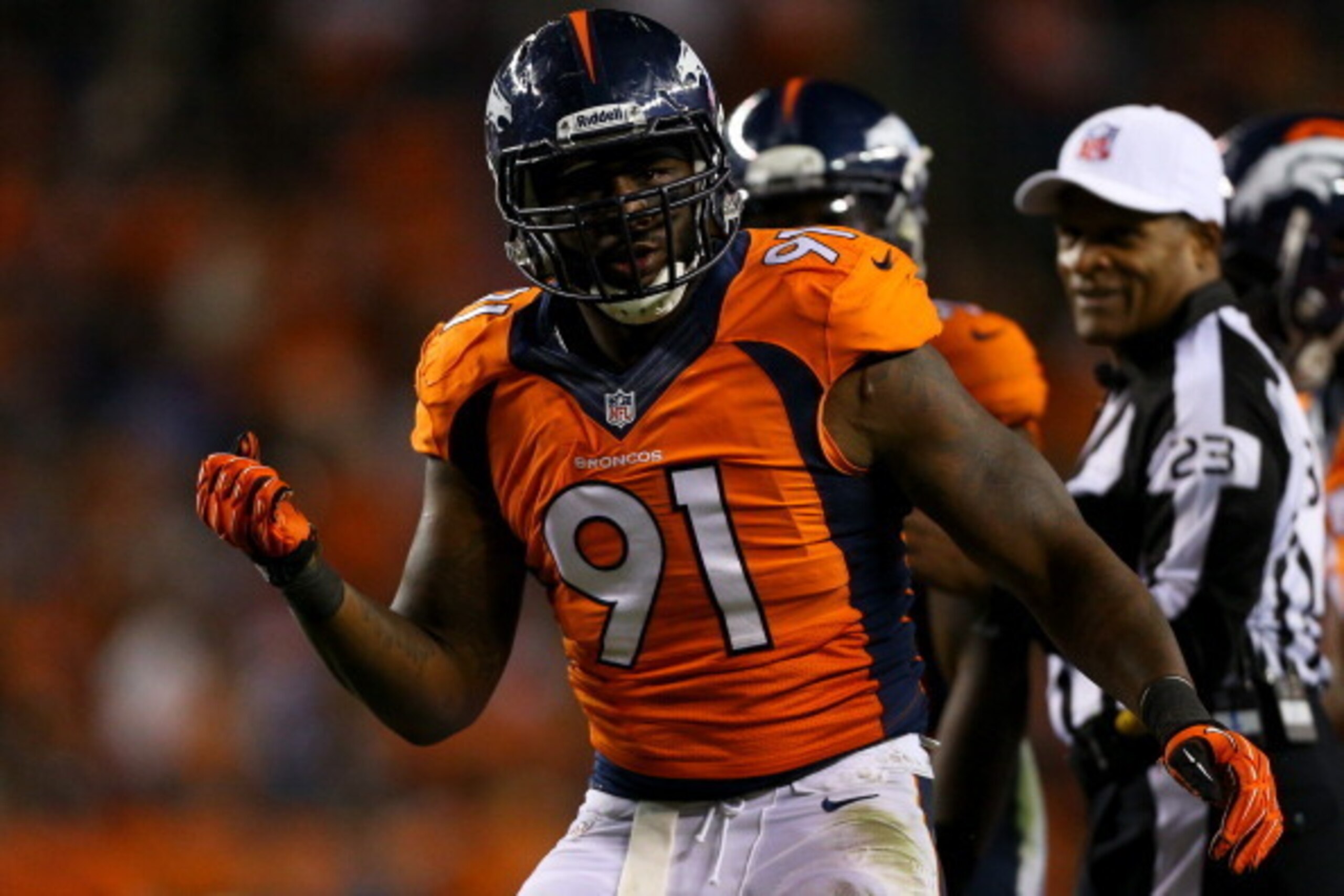 DENVER, CO - SEPTEMBER 23: Defensive end Robert Ayers #91 of the Denver Broncos celebrates after recording a sack against the Oakland Raiders at Sports Authority Field Field at Mile High on September 23, 2013 in Denver, Colorado. The Broncos defeated the DENVER, CO - SEPTEMBER 23: Defensive end Robert Ayers #91 of the Denver Broncos celebrates after recording a sack against the Oakland Raiders at Sports Authority Field Field at Mile High on September 23, 2013 in Denver, Colorado. The Broncos defeated the