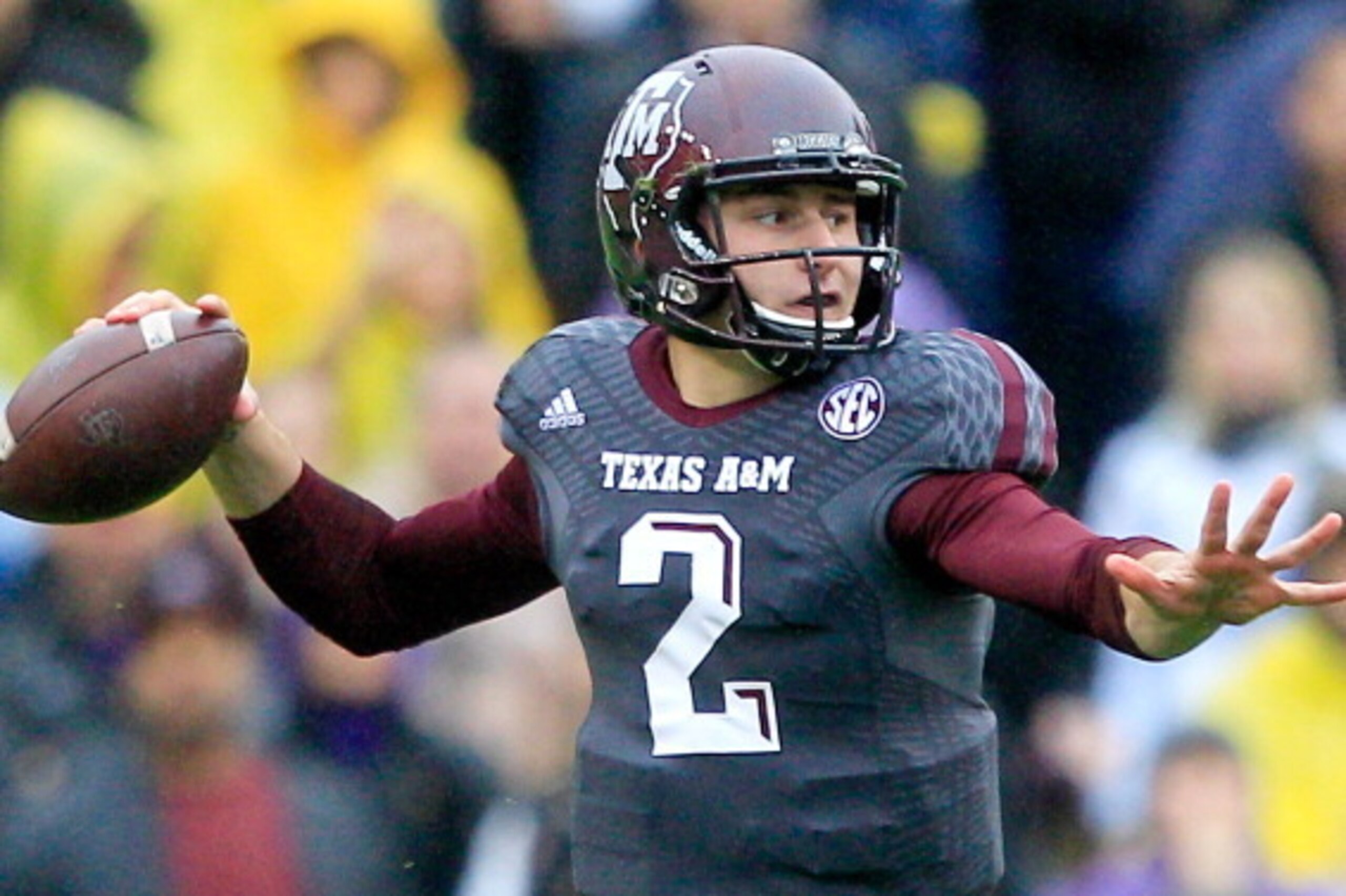 BATON ROUGE, LA - NOVEMBER 23:  Quarterback Johnny Manziel #2 of the Texas A&M Aggies drops back to pass against the LSU Tigers at Tiger Stadium on November 23, 2013 in Baton Rouge, Louisiana.  (Photo by Sean Gardner/Getty Images)