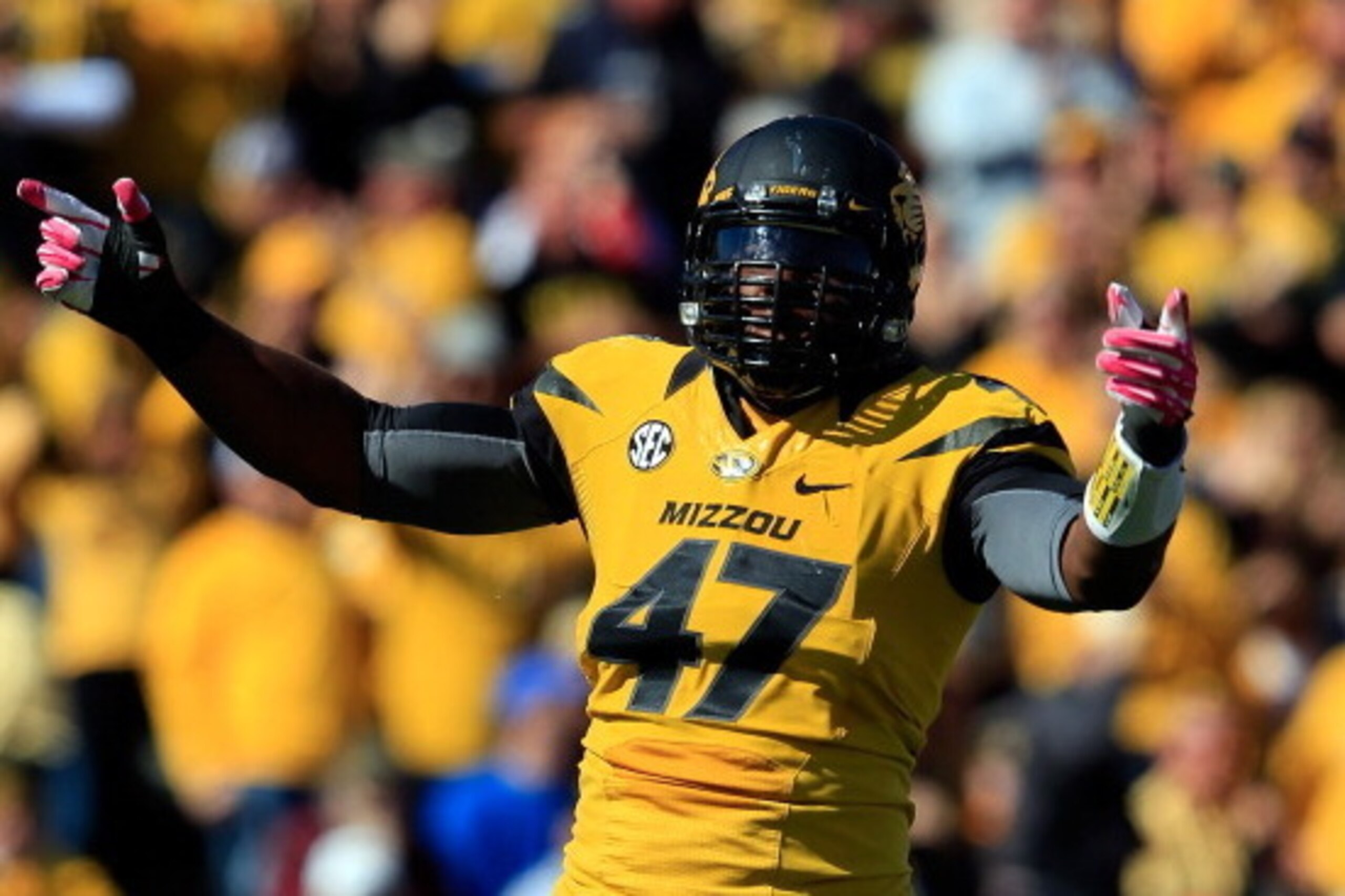 COLUMBIA, MO - OCTOBER 19:  Defensive lineman Kony Ealy #47 of the Missouri Tigers reacts after a sack of quarterback Tyler Murphy #3 of the Florida Gator sduring the game at Faurot Field/Memorial Stadium on October 19, 2013 in Columbia, Missouri.  (Photo