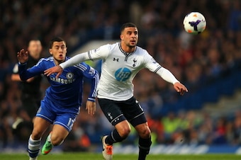 LONDON, ENGLAND - MARCH 08:  Kyle Walker of Spurs holds off the challenge from Eden Hazard of Chelsea during the Barclays Premier League match between Chelsea and Tottenham Hotspur at Stamford Bridge on March 8, 2014 in London, England.  (Photo by Clive R