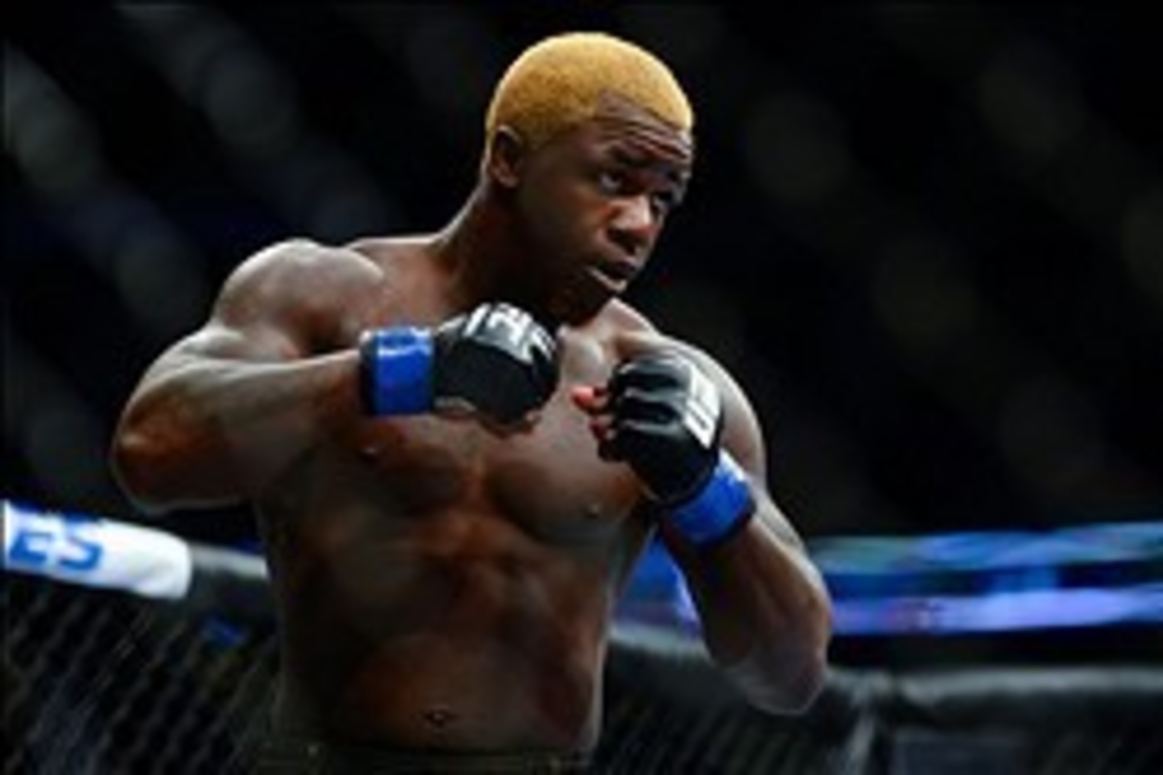 August 11, 2012; Denver, CO, USA; Melvin Guillard fights Donald Cerrone (not pictured) during UFC 150 at the Pepsi Center. Mandatory Credit: Ron Chenoy-USA TODAY Sports