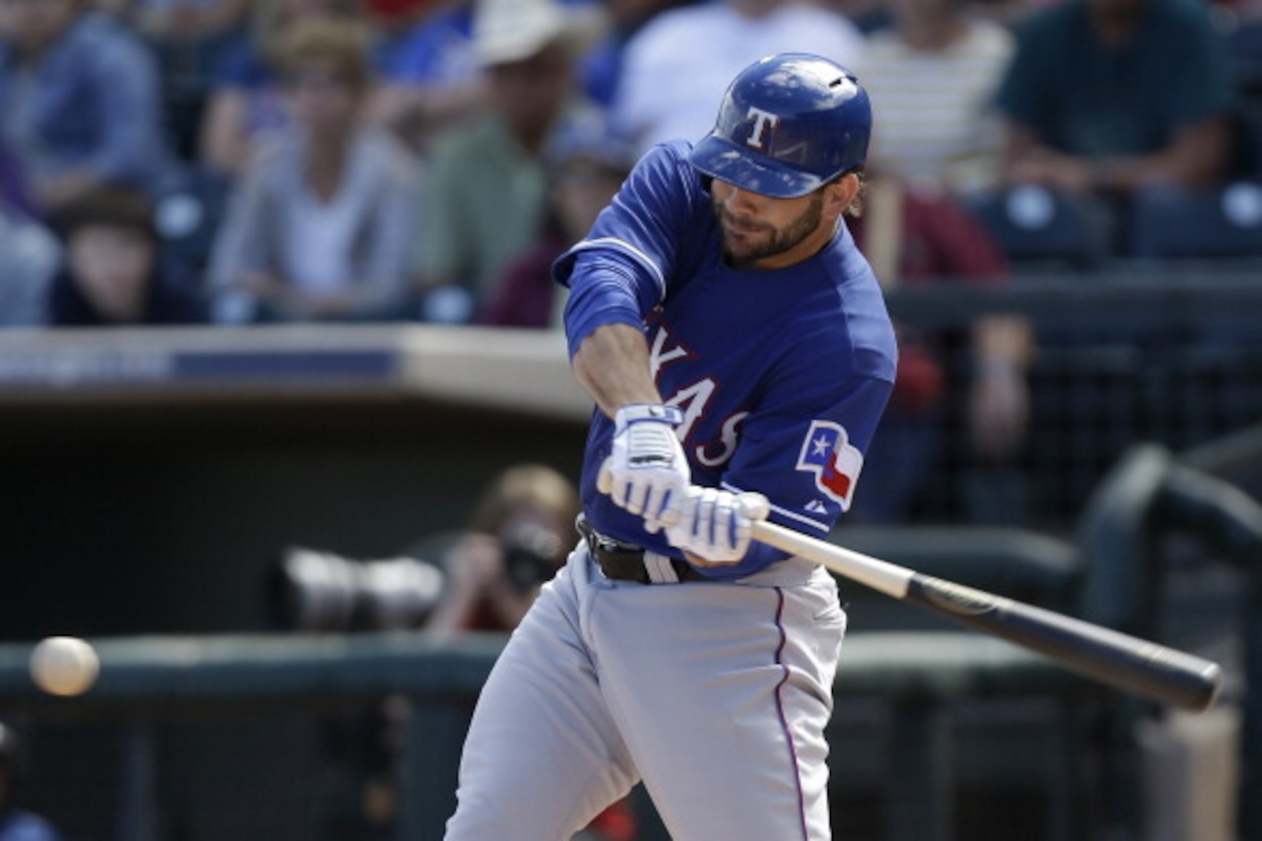 SURPRISE, AZ - FEBRUARY 27: Mitch Moreland #18 of the Texas Rangers hits a double in the top of the second inning against the Kansas City Royals at Surprise Stadium on February 27, 2014 in Surprise, Arizona. (Photo by Mike McGinnis/Getty Images)