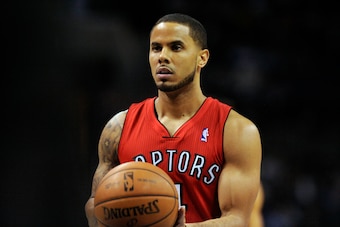 Nov 6, 2013; Charlotte, NC, USA; Toronto Raptors guard D.J. Augustin (14) prepares to shoot a foul shot during the game against the Charlotte Bobcats at Time Warner Cable Arena. Mandatory Credit: Sam Sharpe-USA TODAY Sports