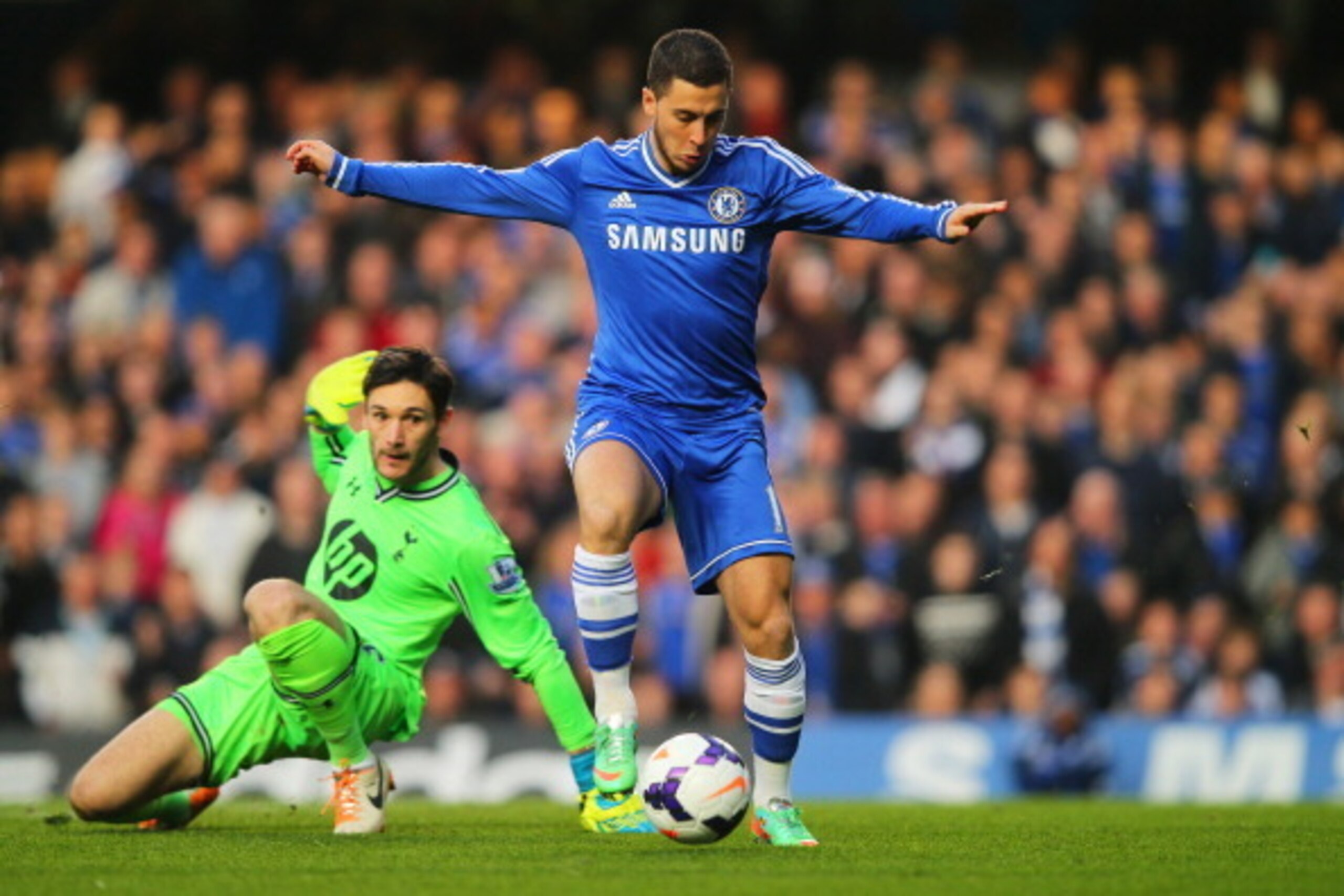 LONDON, ENGLAND - MARCH 08:  Eden Hazard of Chelsea rounds goalkeeper Hugo Lloris of Spurs, but puts his shot wide of theopen goal during the Barclays Premier League match between Chelsea and Tottenham Hotspur at Stamford Bridge on March 8, 2014 in London