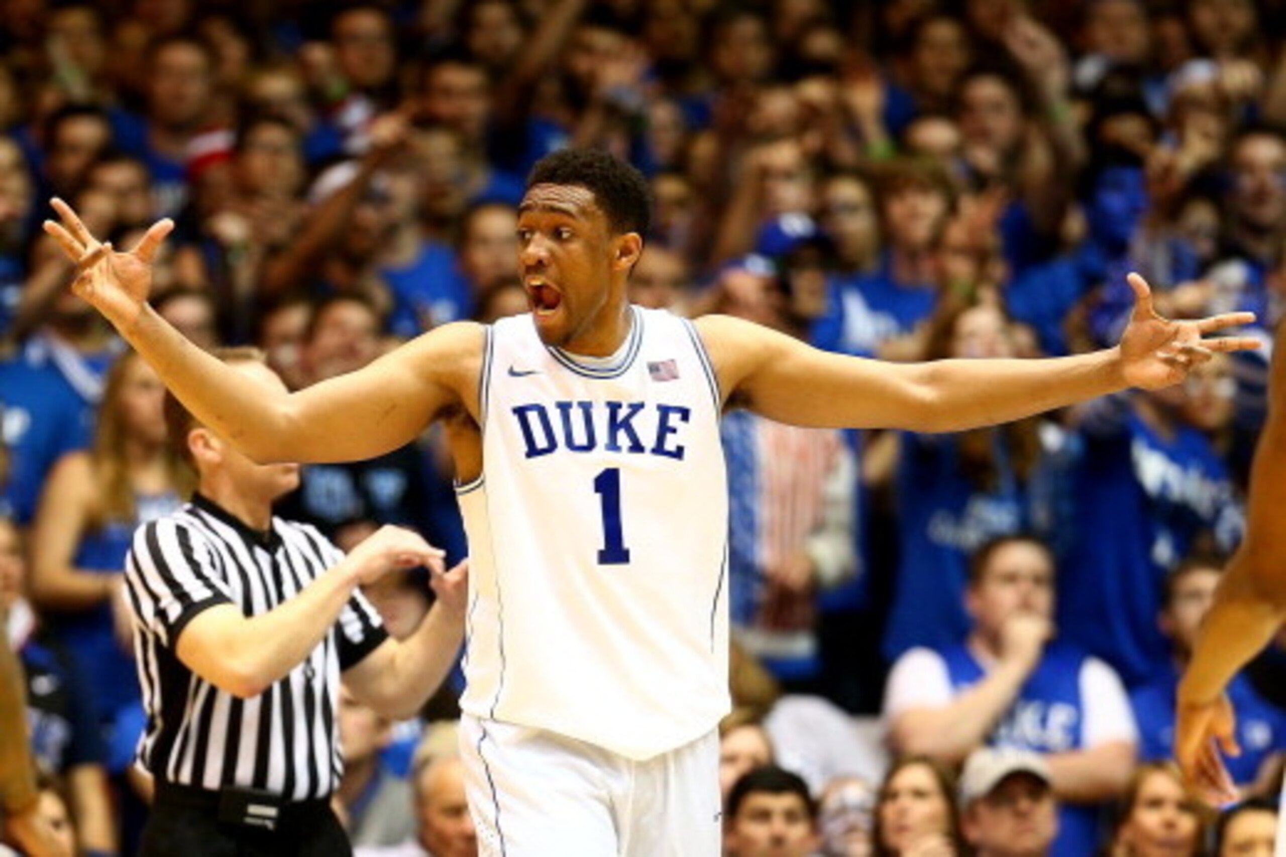 DURHAM, NC - MARCH 08:  Jabari Parker #1 of the Duke Blue Devils reacts after a play during their game against the North Carolina Tar Heels at Cameron Indoor Stadium on March 8, 2014 in Durham, North Carolina.  (Photo by Streeter Lecka/Getty Images)