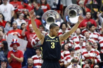 TUCSON, AZ - FEBRUARY 06:  Joseph Young #3 of the Oregon Ducks celebrates a basket against the Arizona Wildcats during the first half of a college basketball game at McKale Center on February 6, 2014 in Tucson, Arizona.  (Photo by Ralph Freso/Getty Images