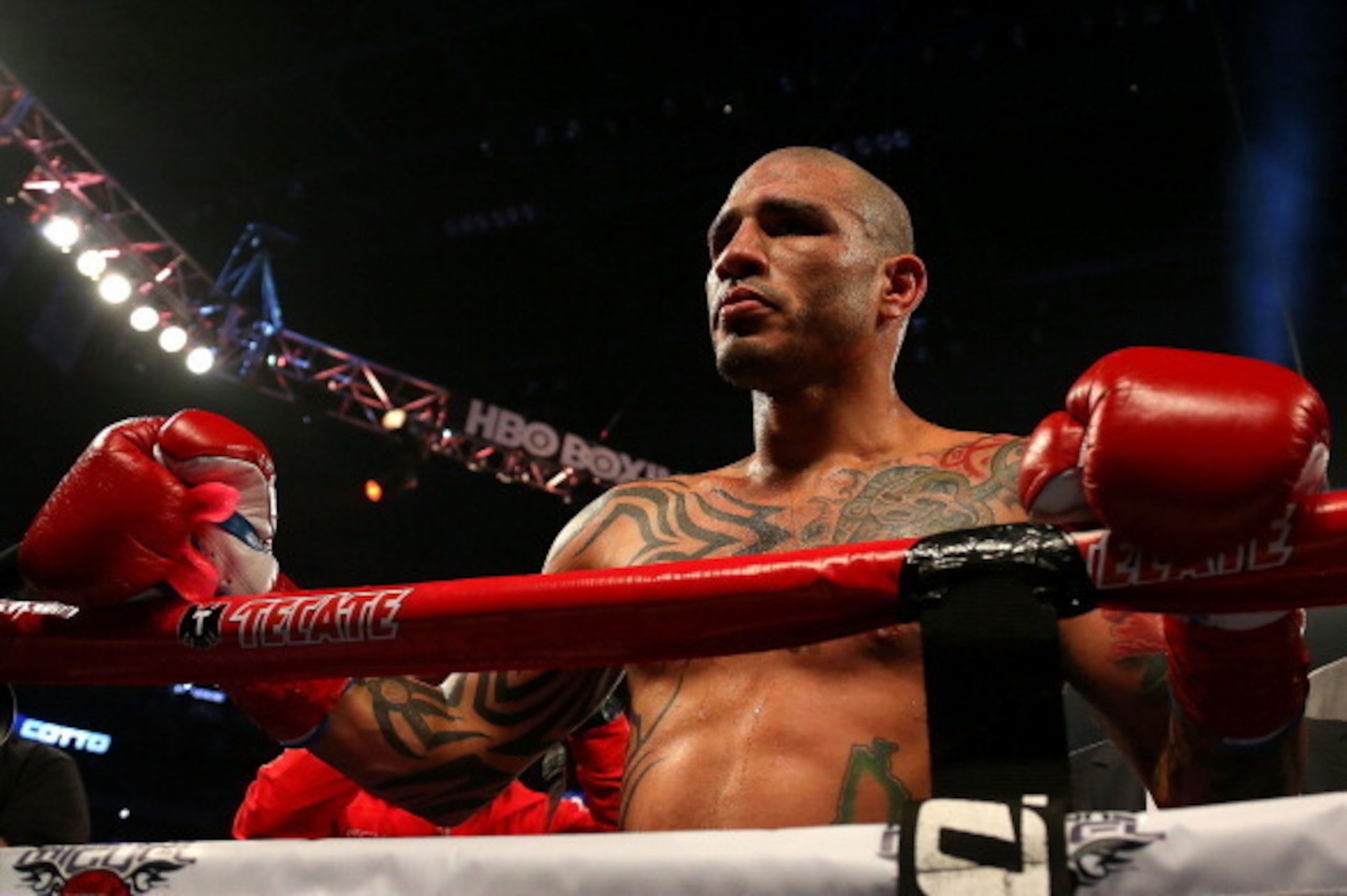 ORLANDO, FL - OCTOBER 05: Miguel Cotto reacts to winning a Super Welterweight bout against Delvin Rodriguez at Amway Center on October 5, 2013 in Orlando, Florida. (Photo by Mike Ehrmann/Getty Images) ORLANDO, FL - OCTOBER 05: Miguel Cotto reacts to winning a Super Welterweight bout against Delvin Rodriguez at Amway Center on October 5, 2013 in Orlando, Florida. (Photo by Mike Ehrmann/Getty Images)