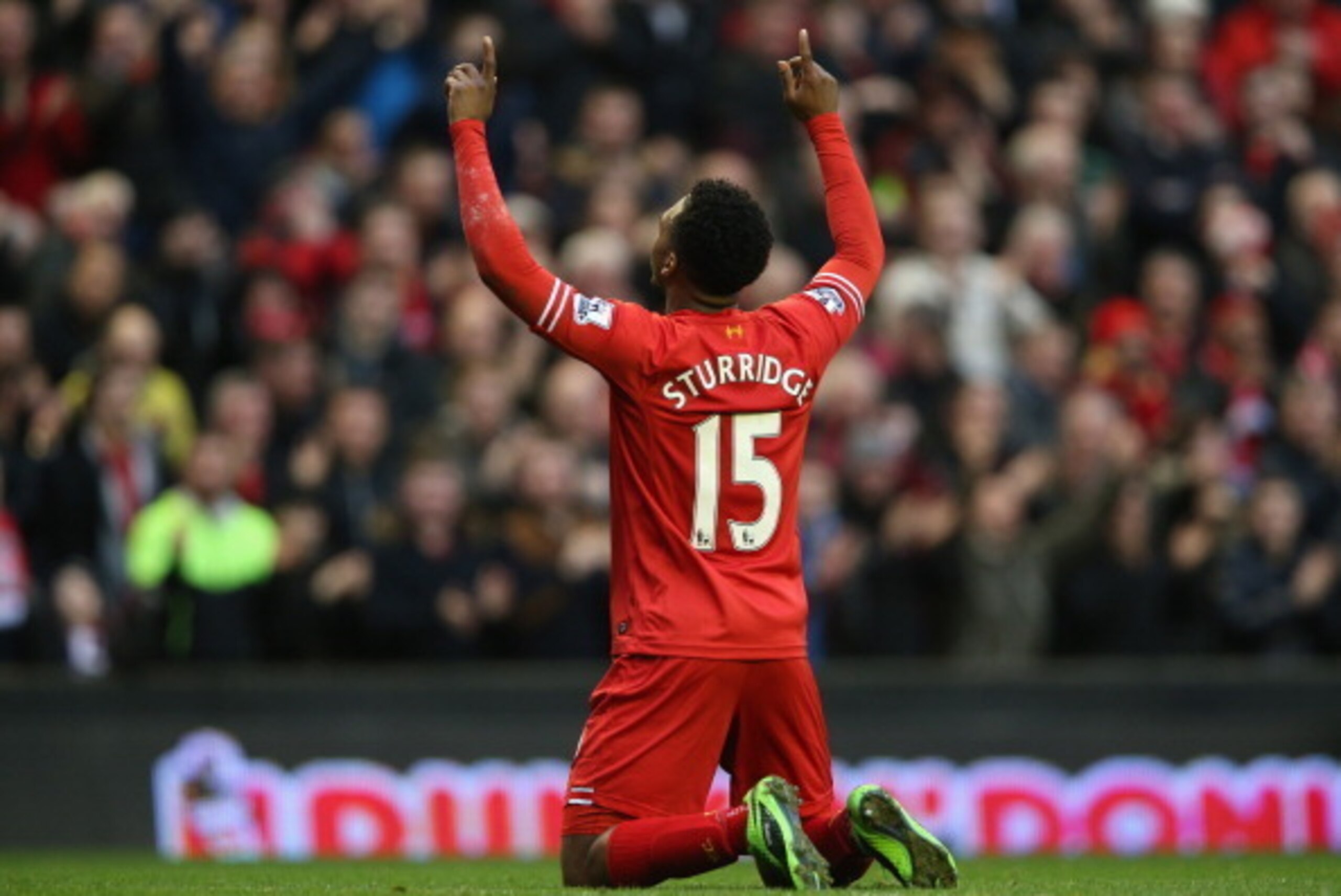 LIVERPOOL, ENGLAND - FEBRUARY 23:  Daniel Sturridge of Liverpool celebrates scoring his team's third goal during the Barclays Premier League match between Liverpool and Swansea City at Anfield on February 23, 2014 in Liverpool, England.  (Photo by Clive B