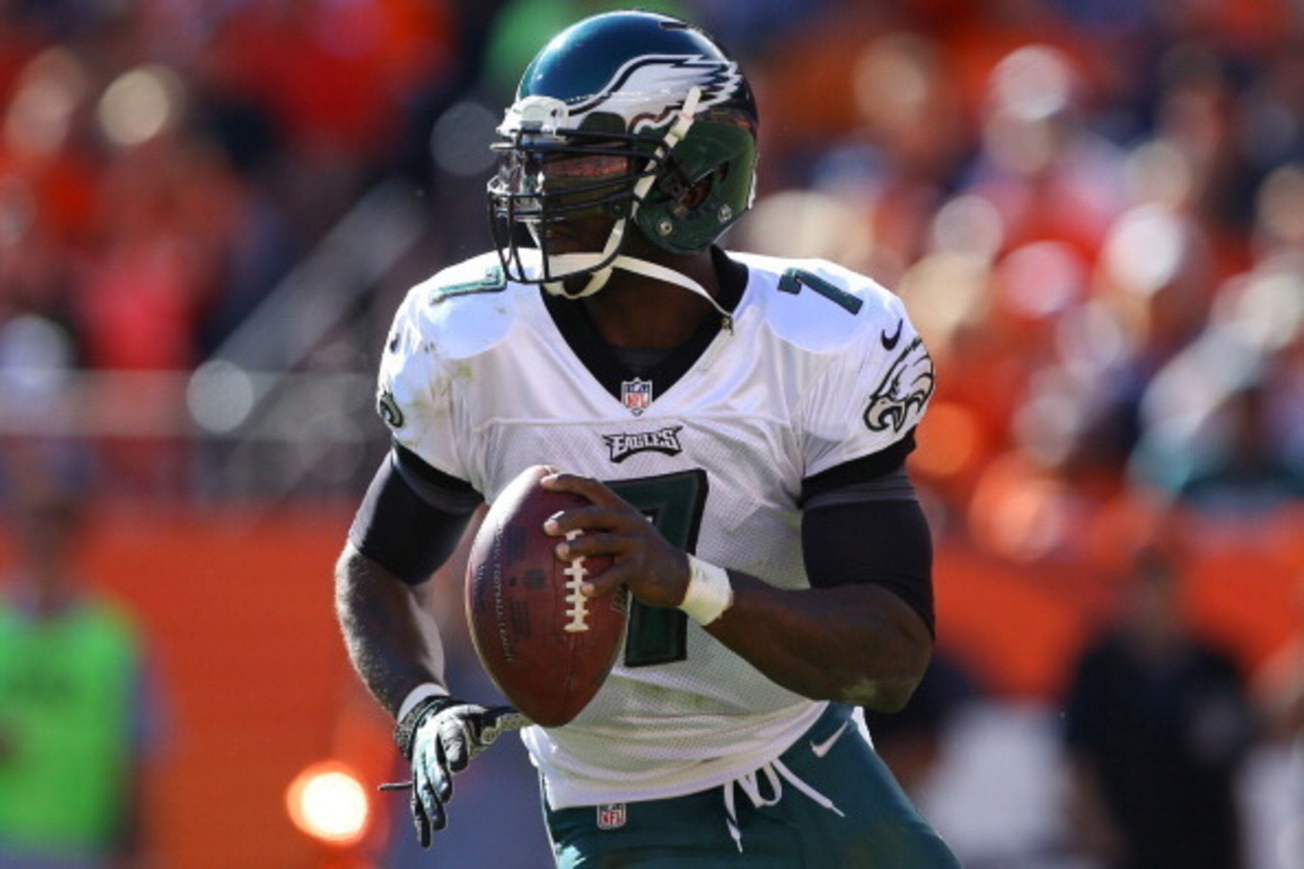 DENVER, CO - SEPTEMBER 29:  Quarterback Michael Vick #7 of the Philadelphia Eagles in action against the Denver Broncos at Sports Authority Field Field at Mile High on September 29, 2013 in Denver, Colorado.  (Photo by Justin Edmonds/Getty Images)
