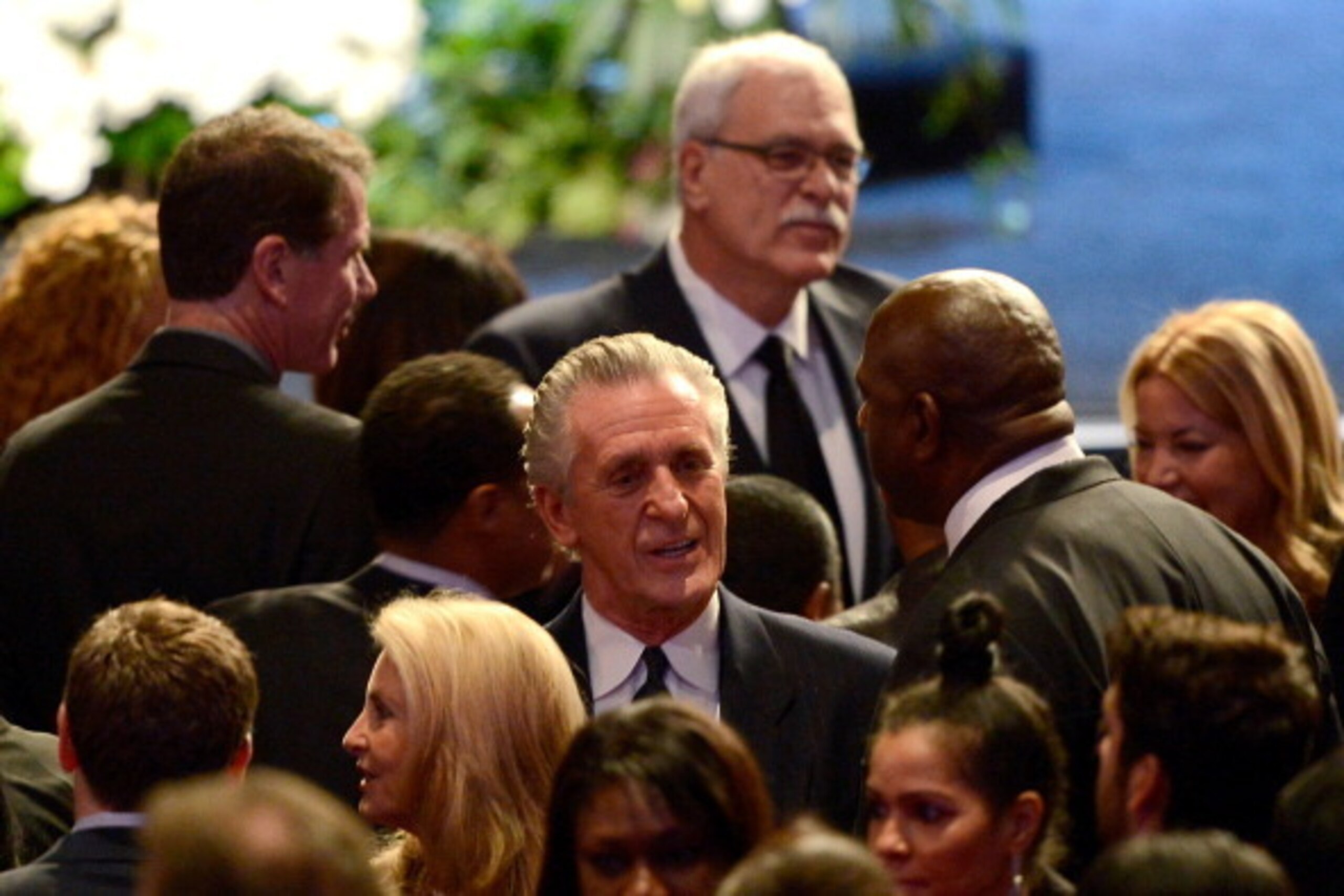 LOS ANGELES, CA - FEBRUARY 21:  (C) Former Los Angeles Lakers head coach Pat Riley, (top) former head coach Phil Jackson and (R) Earvin 'Magic' Johnson are seen before the start of the memorial service for Los Angeles Lakers owner Dr. Jerry Buss at the No