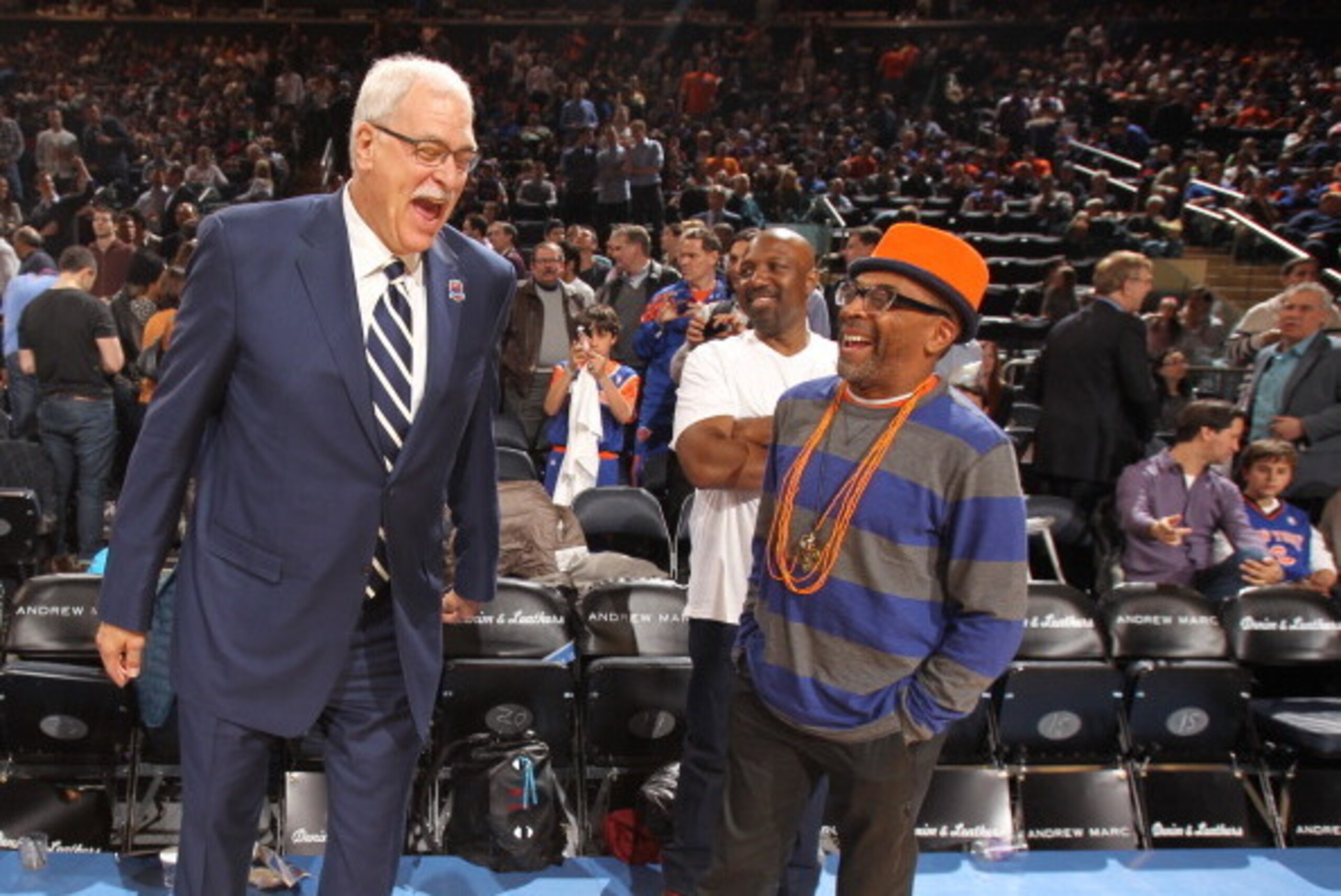 NEW YORK, NY - April 5: Phil Jackson and Spike Lee share a laugh before the game between the New York Knicks and the Milwaukee Bucks on April 5, 2013 at Madison Square Garden in New York City.  NOTE TO USER: User expressly acknowledges and agrees that, by