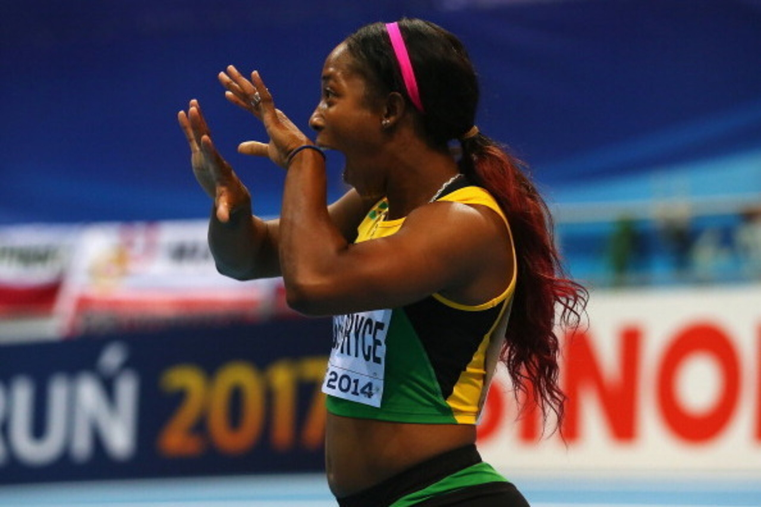 SOPOT, POLAND - MARCH 09:  Shelly-Ann Fraser-Pryce of Jamaica celebrates winning the gold medal in the Women's 60m final during day three of the IAAF World Indoor Championships at Ergo Arena on March 9, 2014 in Sopot, Poland.  (Photo by Alexander Hassenst