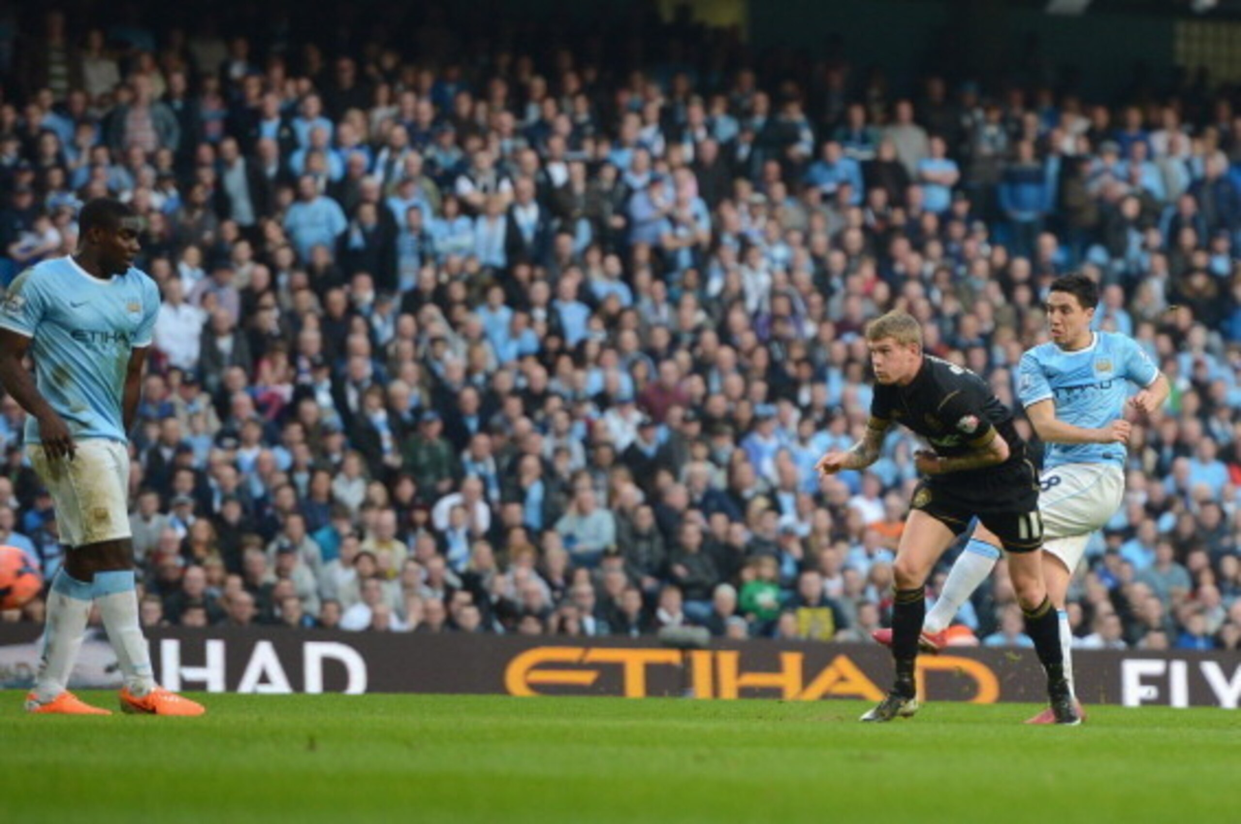 MANCHESTER, ENGLAND - MARCH 09:  Samir Nasri on Man City scores to make it 2-1 during the FA Cup Quarter-Final match between Manchester City and Wigan Athletic at the Etihad Stadium on March 9, 2014 in Manchester, England.  (Photo by Michael Regan/Getty I