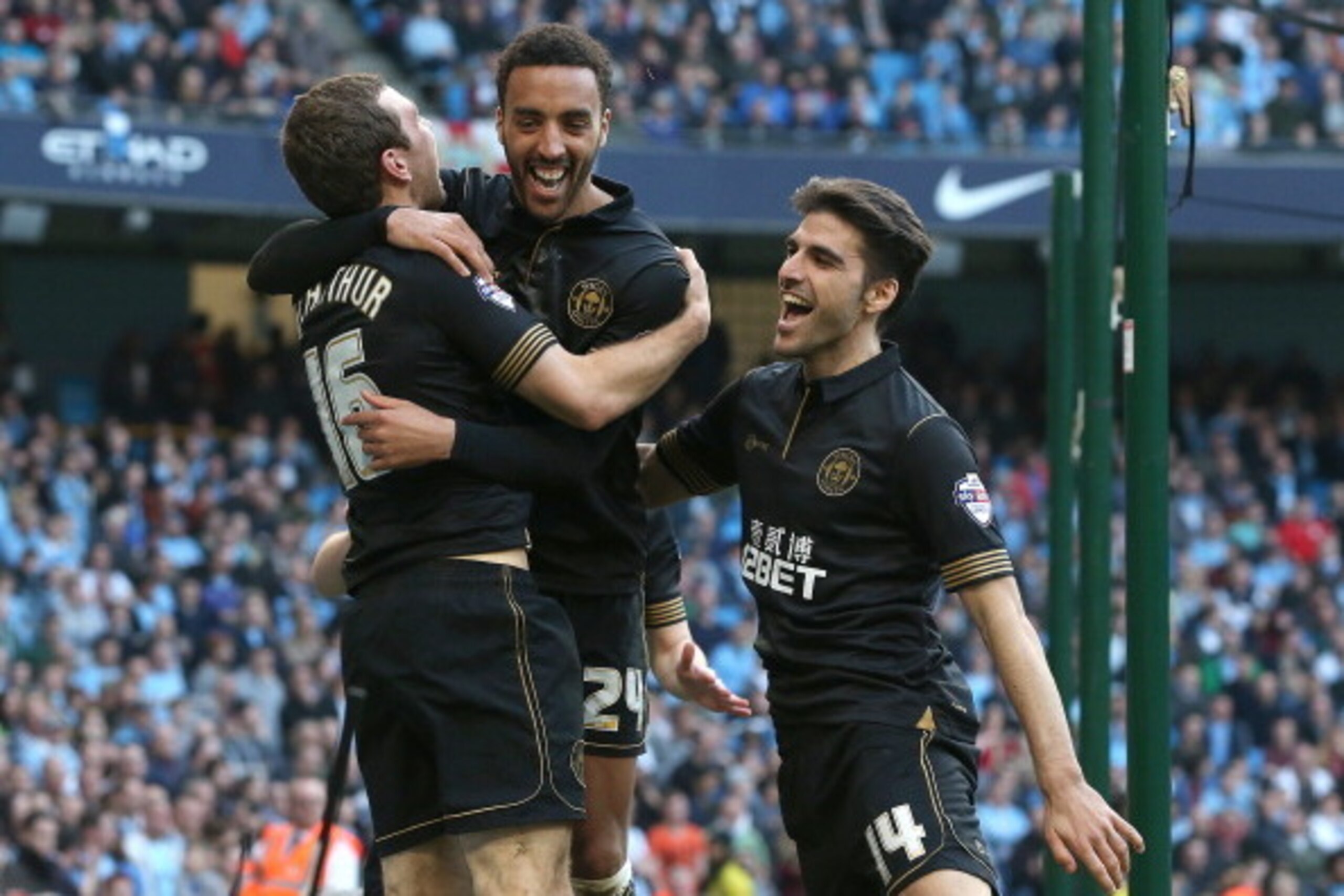 MANCHESTER, ENGLAND - MARCH 09:   James Perch of Wigan Athletic celebrates his goal during the FA Cup Quarter-Final match between Manchester City and Wigan Athletic at the Etihad Stadium on March 9, 2014 in Manchester, England.  (Photo by Jan Kruger/Getty