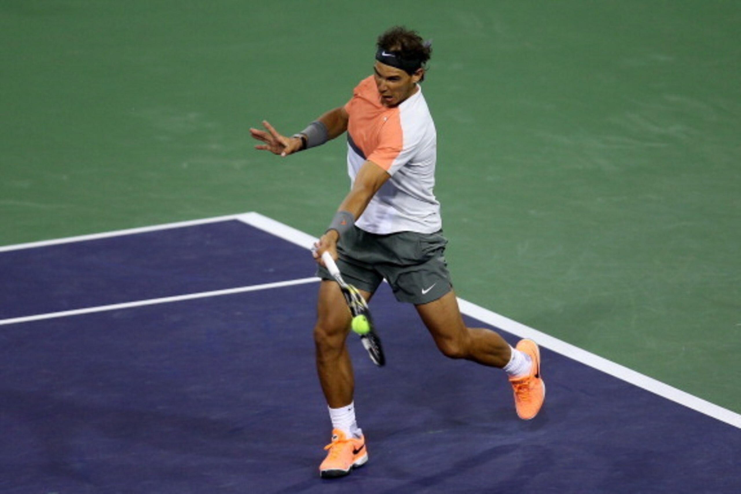 INDIAN WELLS, CA - MARCH 08: Rafael Nadal of Spain hits a winner for match point against Radek Stepanek of the Czech Republic during the BNP Paribas Open at Indian Wells Tennis Garden on March 8, 2014 in Indian Wells, California. Nadal won 2-6, 6-4, 7-5. INDIAN WELLS, CA - MARCH 08: Rafael Nadal of Spain hits a winner for match point against Radek Stepanek of the Czech Republic during the BNP Paribas Open at Indian Wells Tennis Garden on March 8, 2014 in Indian Wells, California. Nadal won 2-6, 6-4, 7-5.