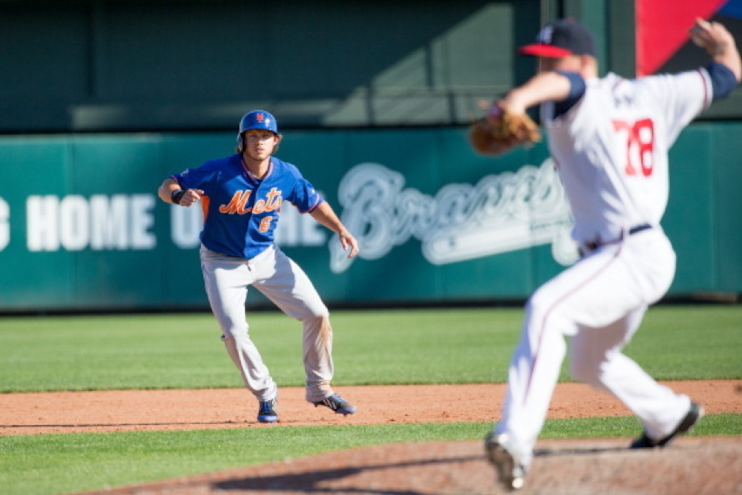 LAKE BUENA VISTA, FL - MARCH 03: Matt den Dekker #6 of the New York Mets leads off second base during the game against the Atlanta Braves at Champion Stadium on March 3, 2014 in Lake Buena Vista, Florida. (Photo by Rob Foldy/Getty Images)
