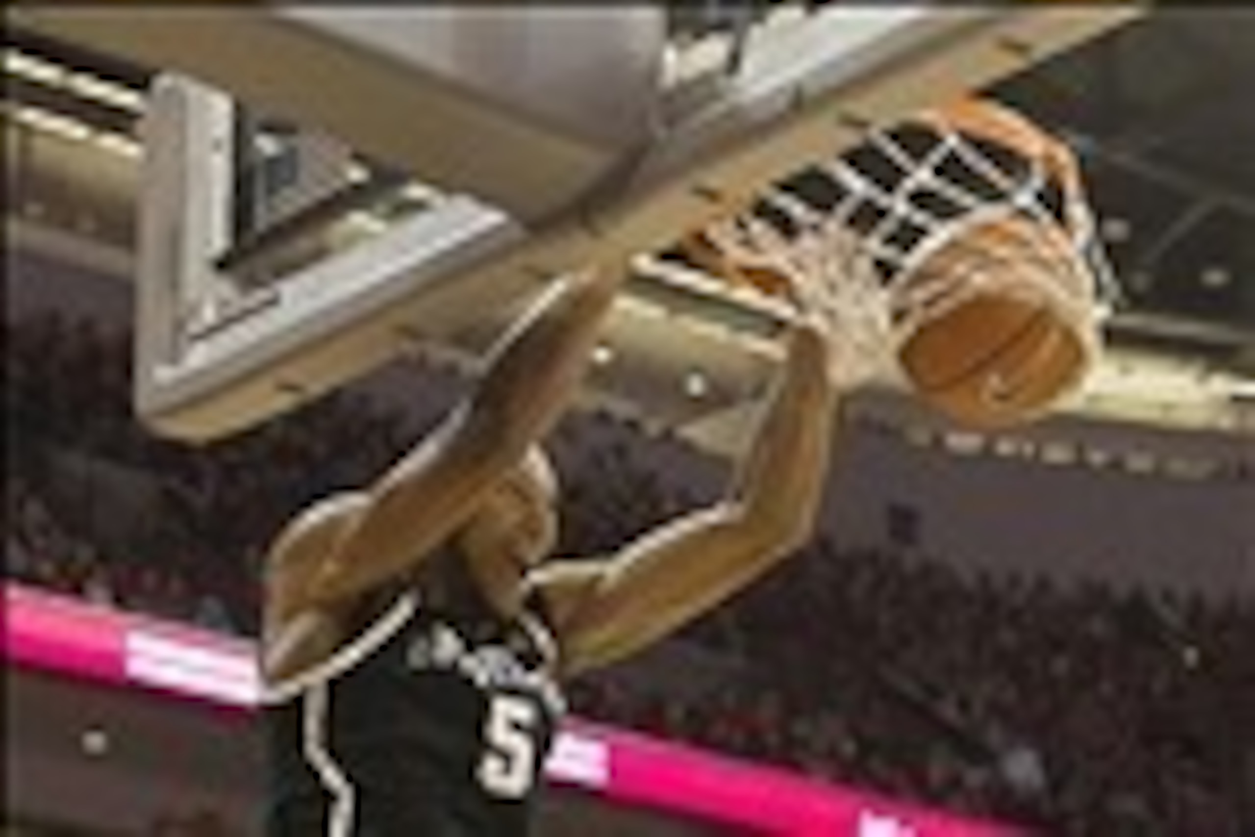Mar 9, 2014; Columbus, OH, USA; Michigan State Spartans forward Adreian Payne (5) dunks against the Ohio State Buckeyes at the Schottenstein Center. Ohio State won the game 69-67. Mandatory Credit: Greg Bartram-USA TODAY Sports