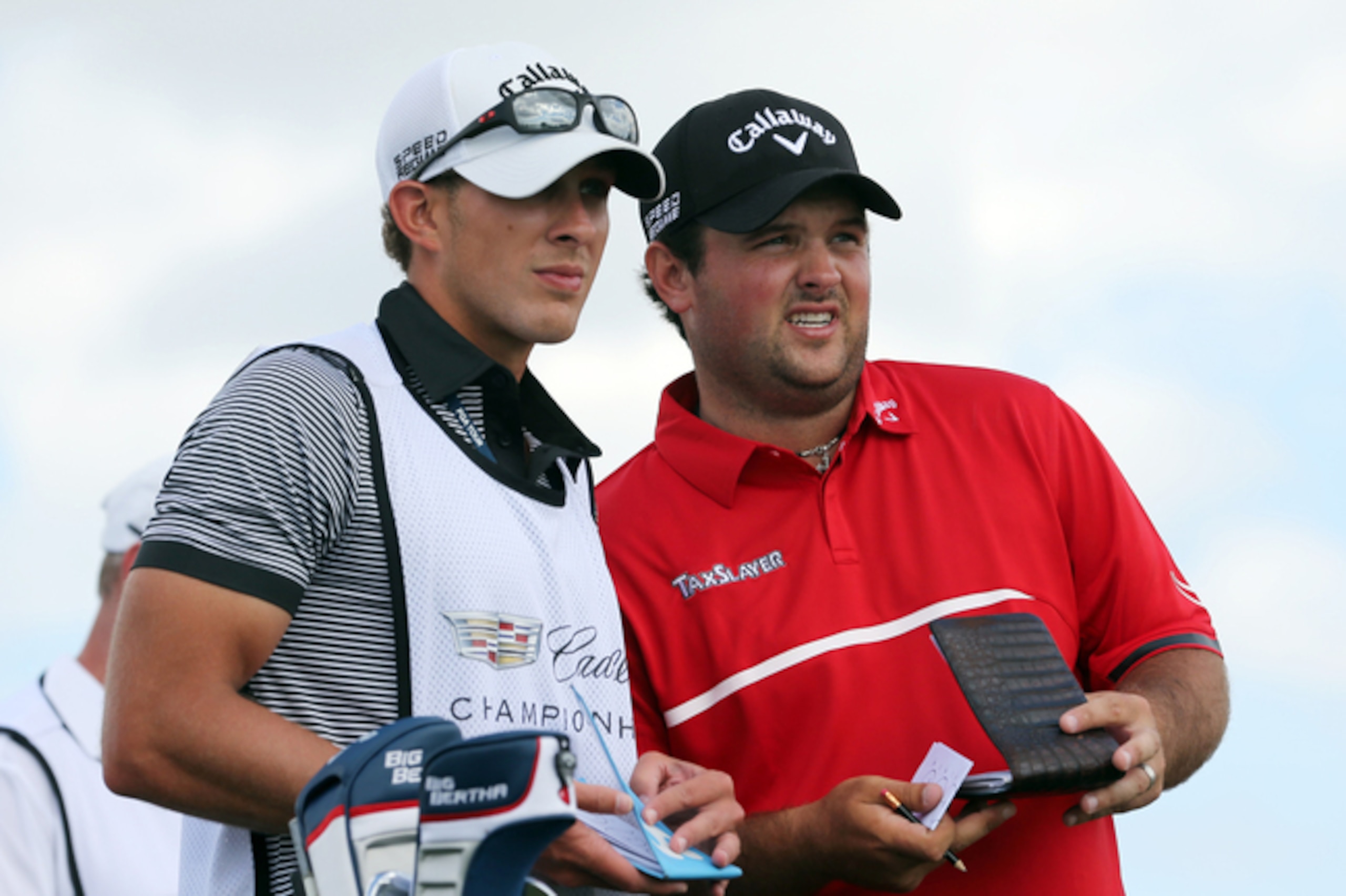 Reed's caddie is his brother-in-law, Kessler Karain.