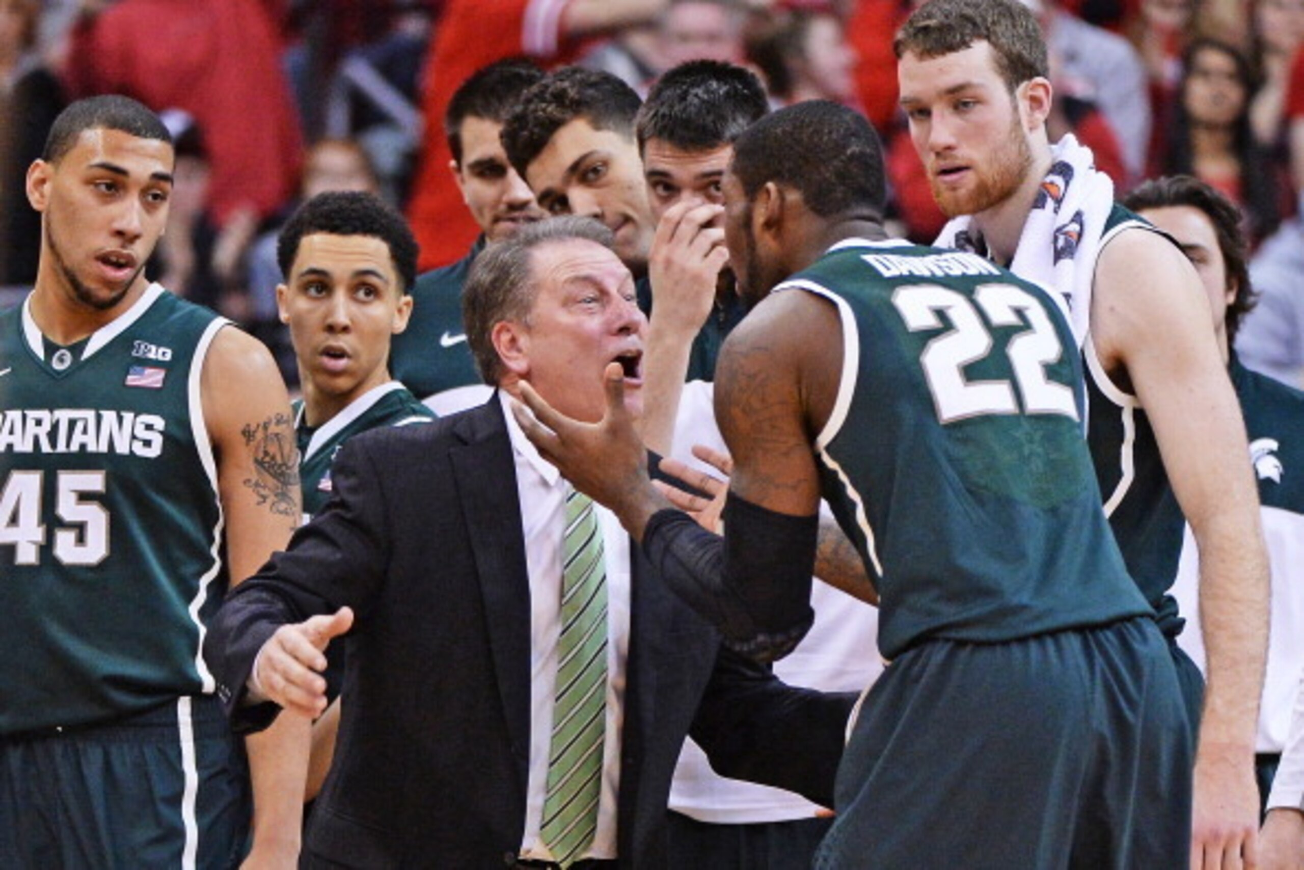 COLUMBUS, OH - MARCH 9:  Head Coach Tom Izzo of the Michigan State Spartans and Branden Dawson #22 of the Michigan State Spartans argue during a timeout in the second half against the Ohio State Buckeyes on March 9, 2014 at Value City Arena in Columbus, O