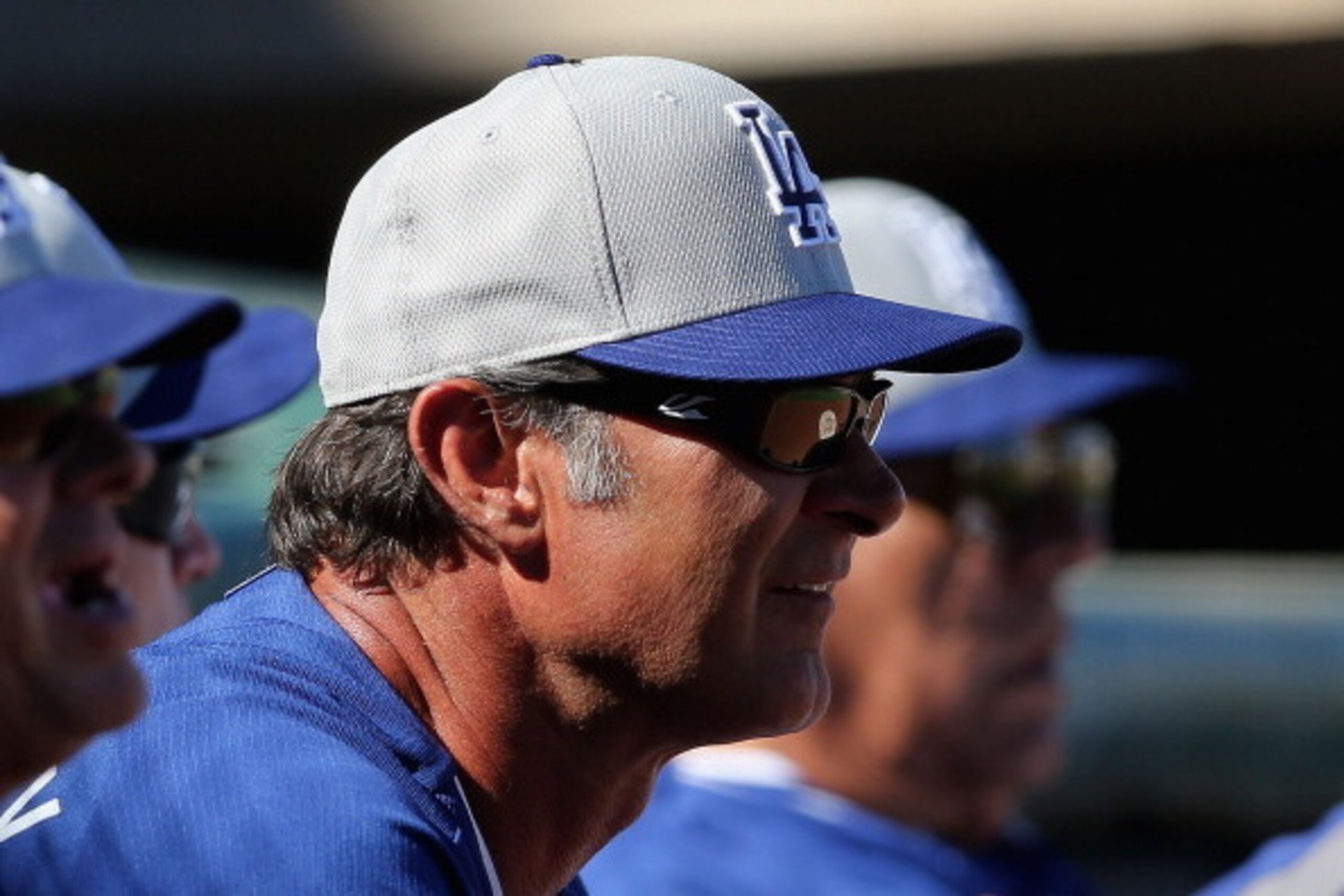 SURPRISE, AZ - MARCH 08: Manager Don Mattingly #8 of the Los Angeles Dodgers watches from the bench during the spring training game against the Texas Rangers at Surprise Stadium on March 8, 2014 in Surprise, Arizona. (Photo by Christian Petersen/Getty I SURPRISE, AZ - MARCH 08: Manager Don Mattingly #8 of the Los Angeles Dodgers watches from the bench during the spring training game against the Texas Rangers at Surprise Stadium on March 8, 2014 in Surprise, Arizona. (Photo by Christian Petersen/Getty I