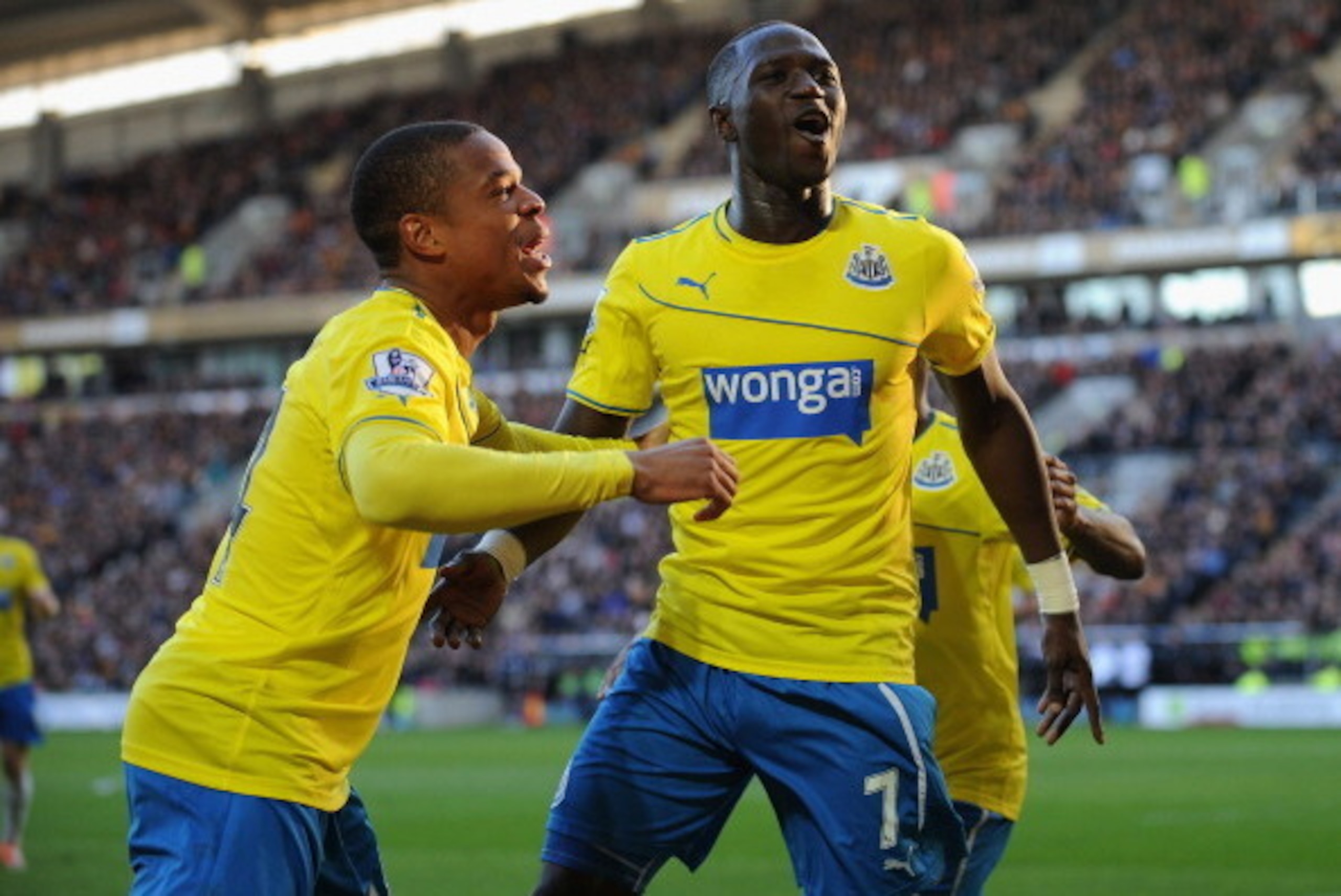 HULL, ENGLAND - MARCH 01:  Moussa Sissoko (R) of Newcastle United celebrates with Loic Remy after scoring their third goal during the Barclays Premier League match between Hull City and Newcastle United at KC Stadium on March 1, 2014 in Hull, England.  (P