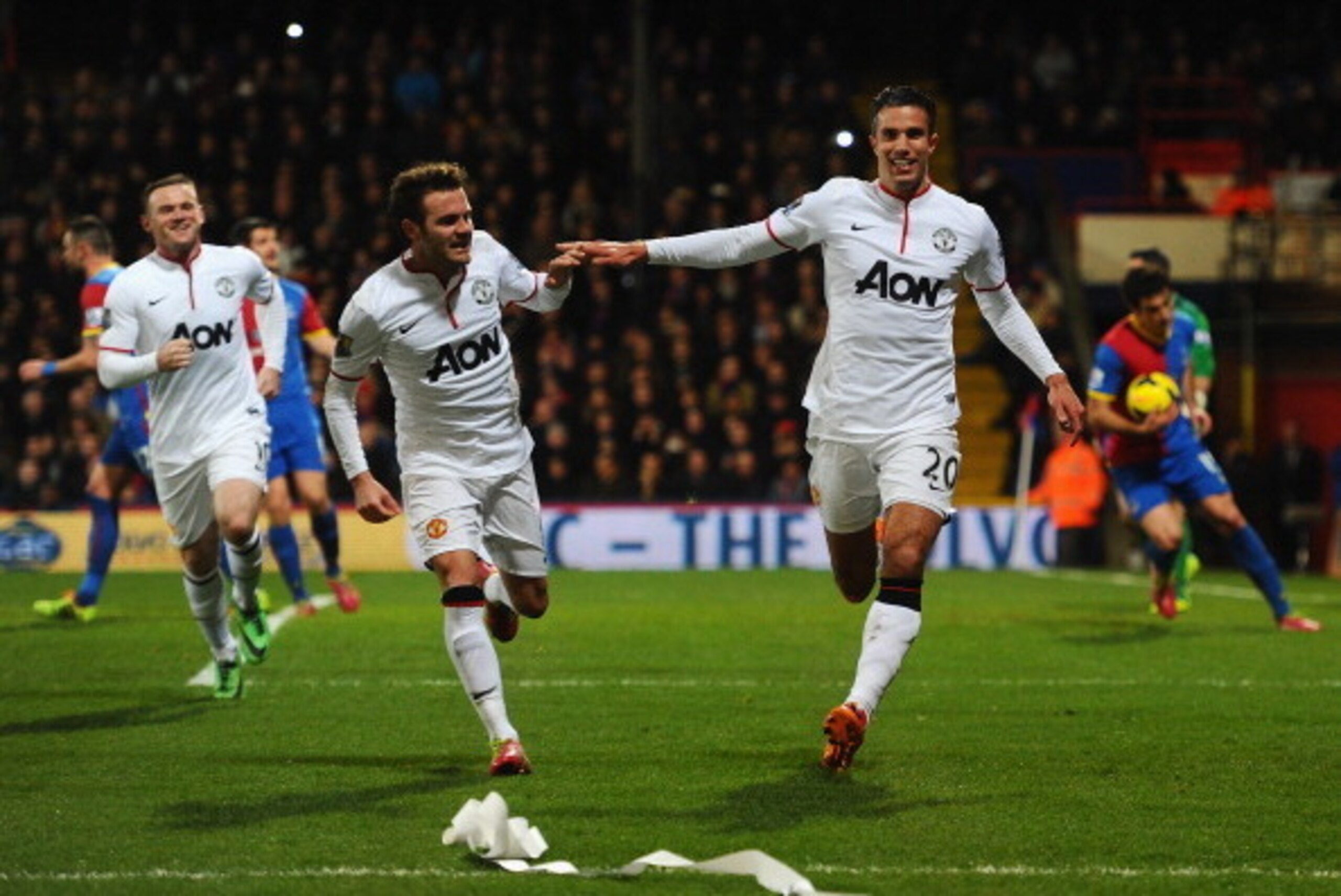 LONDON, ENGLAND - FEBRUARY 22:  Robin Van Persie of Man United celebrates with Juan Mata after scoring from the spot during the Barclays Premier League match between Crystal Palace and Manchester United at Selhurst Park on February 22, 2014 in London, Eng