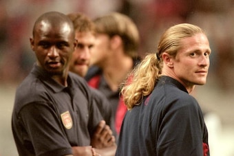 3 Aug 2000:  Patrick Vieira (left) of Arsenal chats to former team-mate Emmanuel Petit (right) of Barcelona during the Pre-Season Friendly Tournament match at the Amsterdam ArenA, in Amsterdam, Holland. Barcelona won the match 2-1. \ Mandatory Credit: Sha