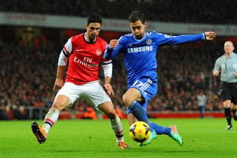 LONDON, ENGLAND - DECEMBER 23:  Mikel Arteta of Arsenal marshalls Eden Hazard of Chelsea during the Barclays Premier League match between Arsenal and Chelsea at Emirates Stadium on December 23, 2013 in London, England.  (Photo by Shaun Botterill/Getty Ima