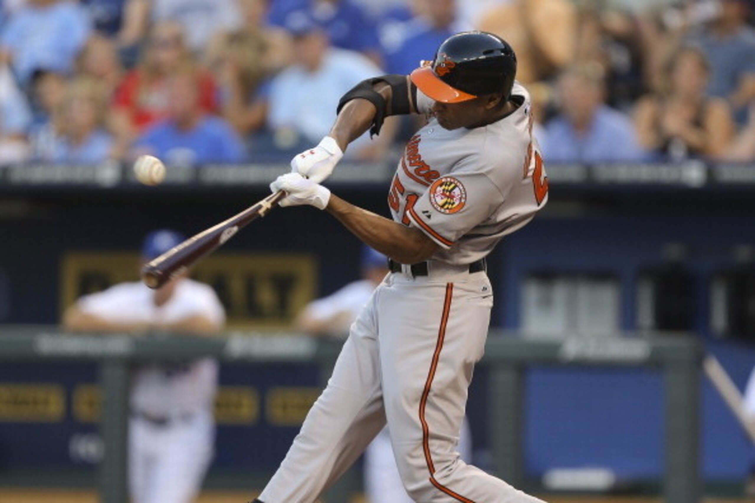 KANSAS CITY, MO - JULY 22:  Henry Urrutia #51 of the Baltimore Orioles hits a RBI single in the third inning during a game against the Kansas City Royals at Kauffman Stadium on July 22, 2013 in Kansas City, Missouri. (Photo by Ed Zurga/Getty Images)