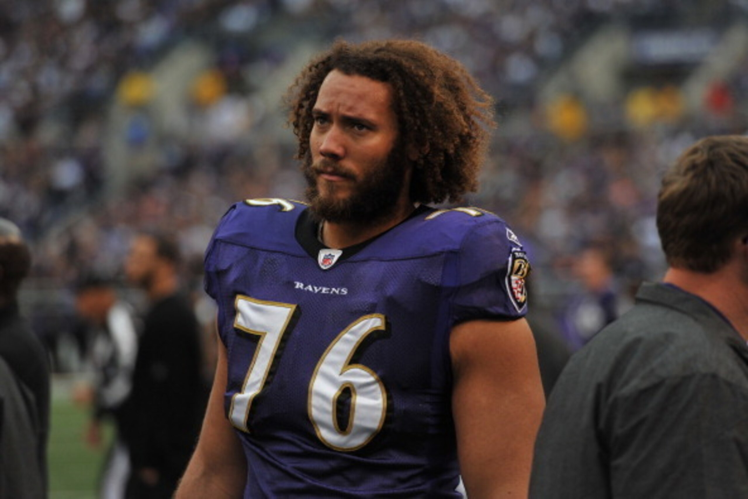 BALTIMORE - NOVEMBER 20:  Jah Reid #76 of the Baltimore Ravens watches from the sidelines during the game against the Cincinnati Bengals at M&T Bank Stadium on November 20, 2011 in Baltimore, Maryland. The Ravens defeated the Bengals 31-24. (Photo by Larr