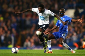LONDON, ENGLAND - MARCH 08:  Emmanuel Adebayor of Spurs is challenged by Ramires of Chelsea during the Barclays Premier League match between Chelsea and Tottenham Hotspur at Stamford Bridge on March 8, 2014 in London, England.  (Photo by Clive Rose/Getty 