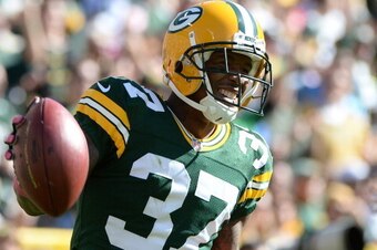 GREEN BAY, WI - OCTOBER 06:  Sam Shields #37 of the Green Bay Packers reacts as he is called for a penalty during the game against the Detroit Lions at Lambeau Field on October 6, 2013 in Green Bay, Wisconsin.  (Photo by Harry How/Getty Images)