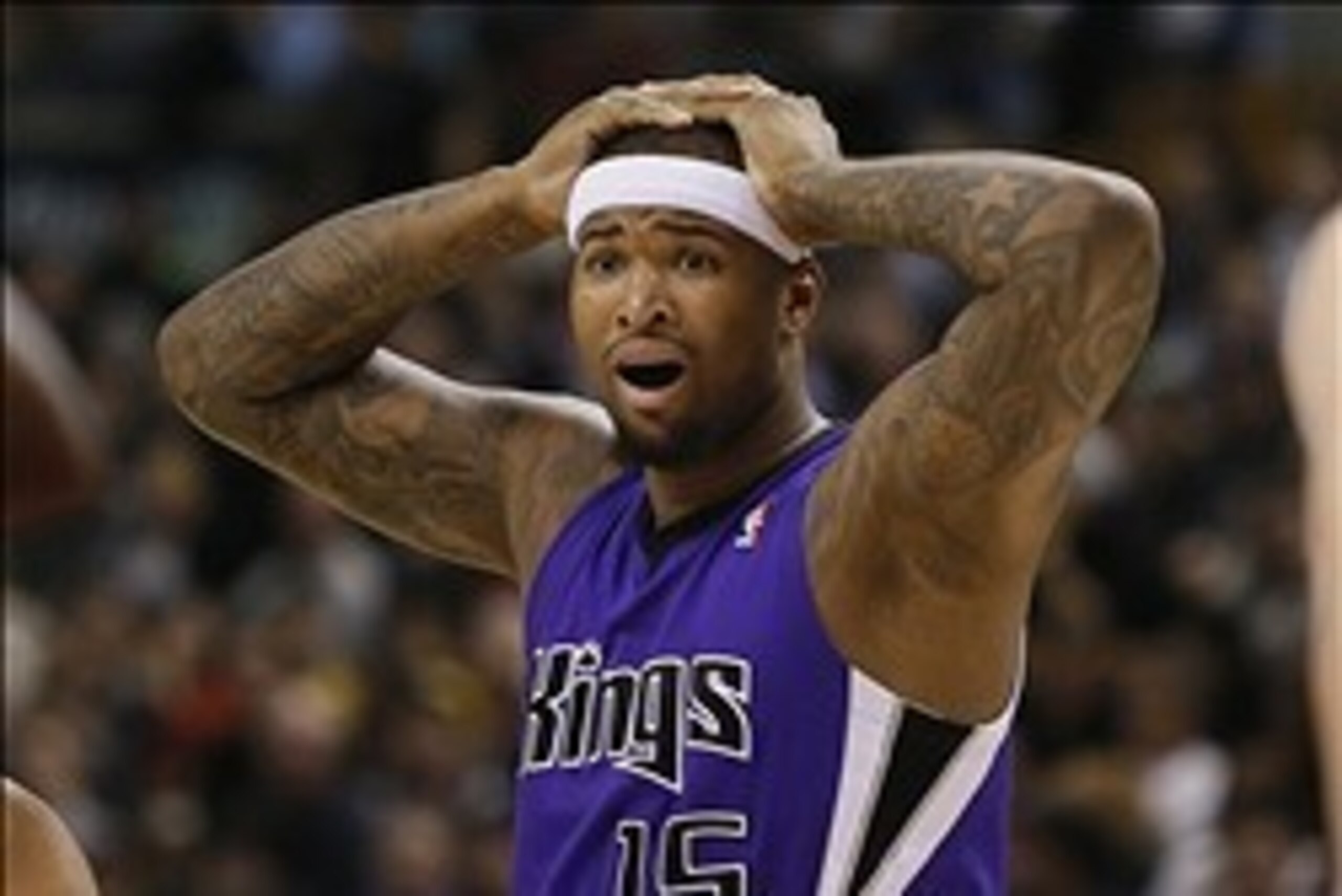 Mar 7, 2014; Toronto, Ontario, CAN; Sacramento Kings center DeMarcus Cousins (15) reacts to a call during the first half against the Toronto Raptors at Air Canada Centre. Mandatory Credit: John E. Sokolowski-USA TODAY Sports
