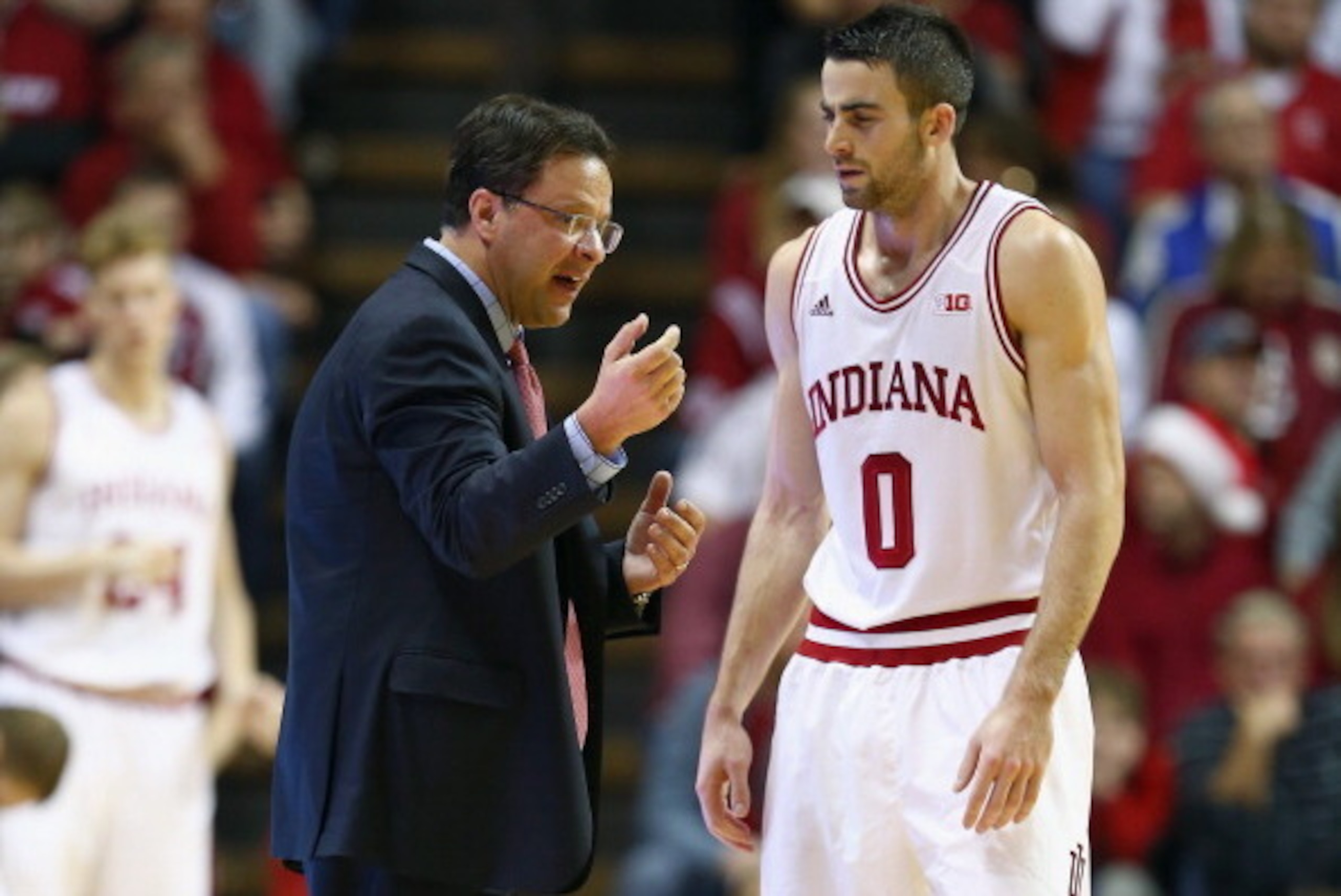 BLOOMINGTON, IN - DECEMBER 20:  Tom Crean the head coach of the Indiana Hoosiers gives instructions to Will Sheehey #0 during the game against the Nicholls State Colonels at Assembly Hall on December 20, 2013 in Bloomington, Indiana.  (Photo by Andy Lyons