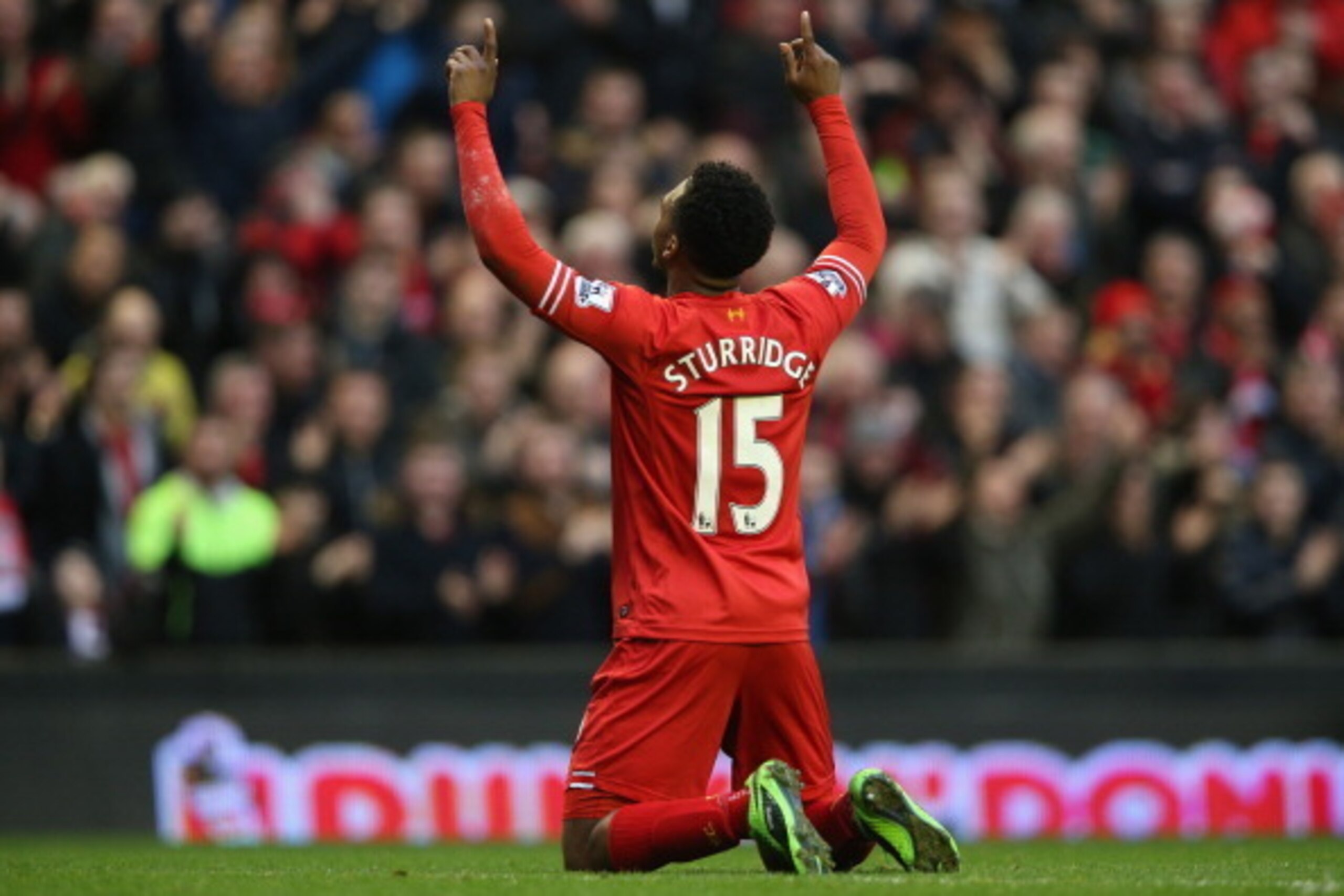 LIVERPOOL, ENGLAND - FEBRUARY 23:  Daniel Sturridge of Liverpool celebrates scoring his team's third goal during the Barclays Premier League match between Liverpool and Swansea City at Anfield on February 23, 2014 in Liverpool, England.  (Photo by Clive B