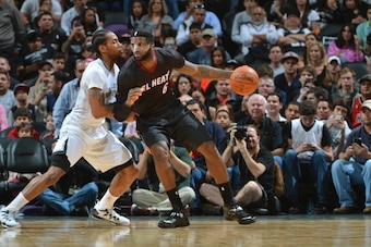 SAN ANTONIO, TX - MARCH 6: LeBron James #6 of the Miami Heat handles the ball against the San Antonio Spurs at the AT&T Center March 6, 2014 in San Antonio, Texas. NOTE TO USER: User expressly acknowledges and agrees that, by downloading and or using this