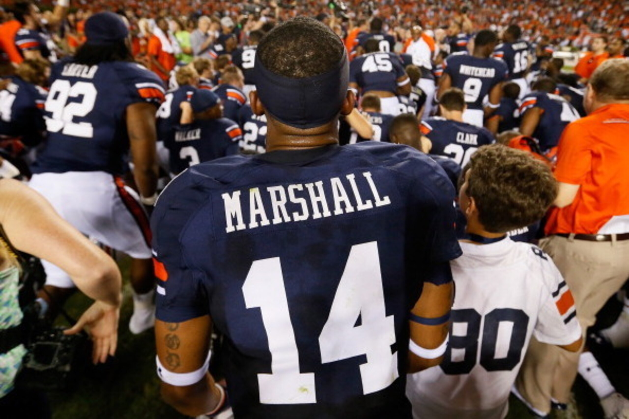 AUBURN, AL - SEPTEMBER 14:  Nick Marshall #14 of the Auburn Tigers celebrates after their 24-20 win over the Mississippi State Bulldogs at Jordan-Hare Stadium on September 14, 2013 in Auburn, Alabama.  (Photo by Kevin C. Cox/Getty Images)