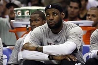 Mar 6, 2014; San Antonio, TX, USA; Miami Heat forward LeBron James (6) watches from the bench during the first half against the San Antonio Spurs at AT&T Center. Mandatory Credit: Soobum Im-USA TODAY Sports
