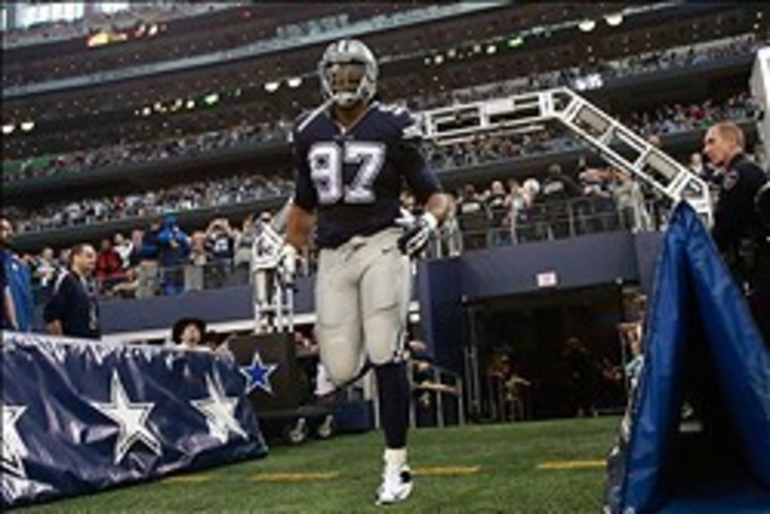 Nov 28, 2013; Arlington, TX, USA; Dallas Cowboys defensive tackle Jason Hatcher (97) runs on the field before the game against the Oakland Raiders during a NFL football game on Thanksgiving at AT&T Stadium. Dallas beat Oakland 31-24. Mandatory Credit: Tim Nov 28, 2013; Arlington, TX, USA; Dallas Cowboys defensive tackle Jason Hatcher (97) runs on the field before the game against the Oakland Raiders during a NFL football game on Thanksgiving at AT&T Stadium. Dallas beat Oakland 31-24. Mandatory Credit: Tim