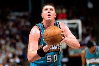 SACRAMENTO, CA - APRIL 8: Bryant Reeves #50 of the Vancouver Grizzlies shoots a foul shot against the Sacramento Kings during a game played on April 8, 1997 at Arco Arena in Sacramento, California. NOTE TO USER: User expressly acknowledges and agrees that