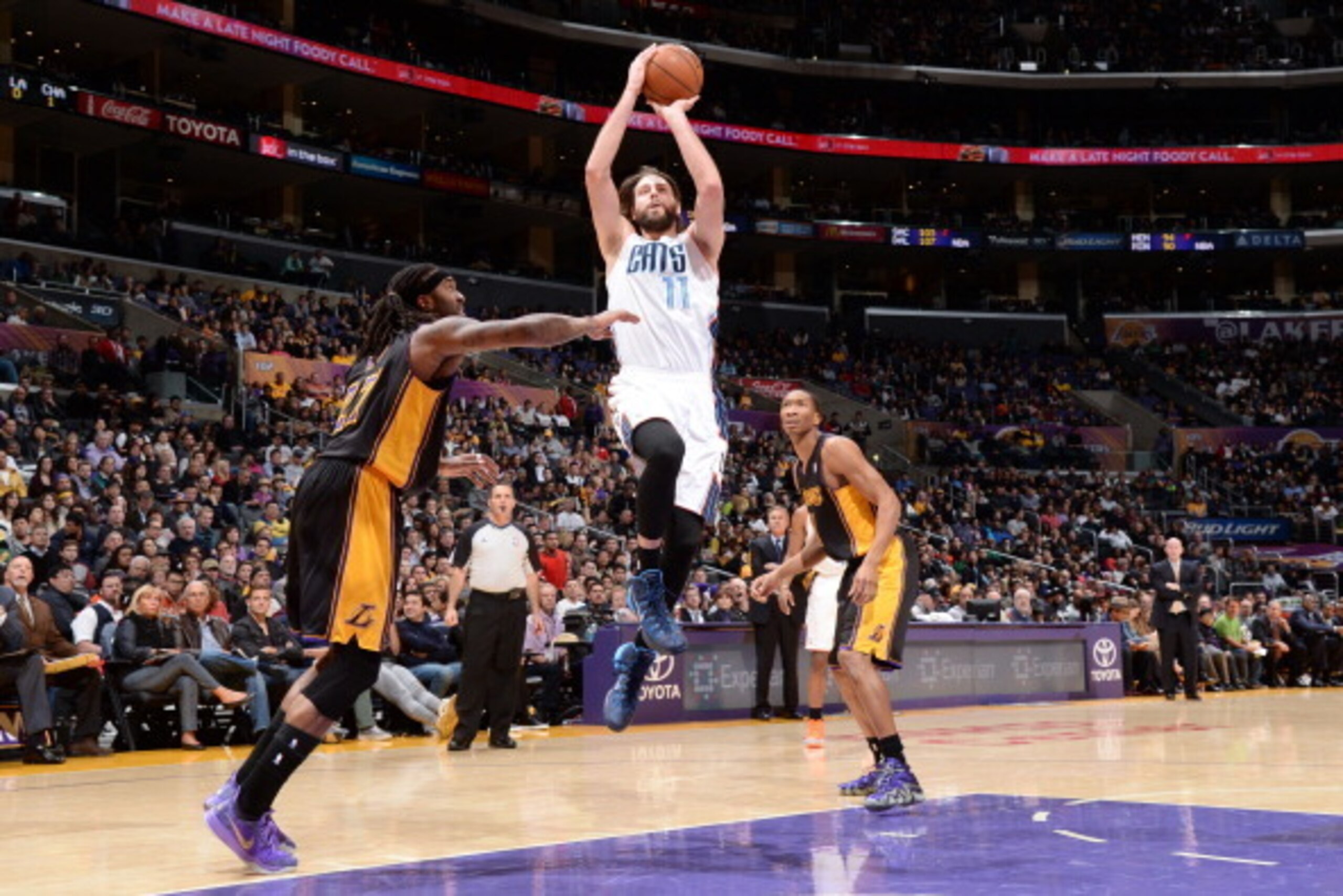 LOS ANGELES, CA - JANUARY 31: Josh McRoberts #11 of the Charlotte Bobcats shoots against the Los Angeles Lakers at STAPLES Center on January 31, 2014 in Los Angeles, California. NOTE TO USER: User expressly acknowledges and agrees that, by downloading and