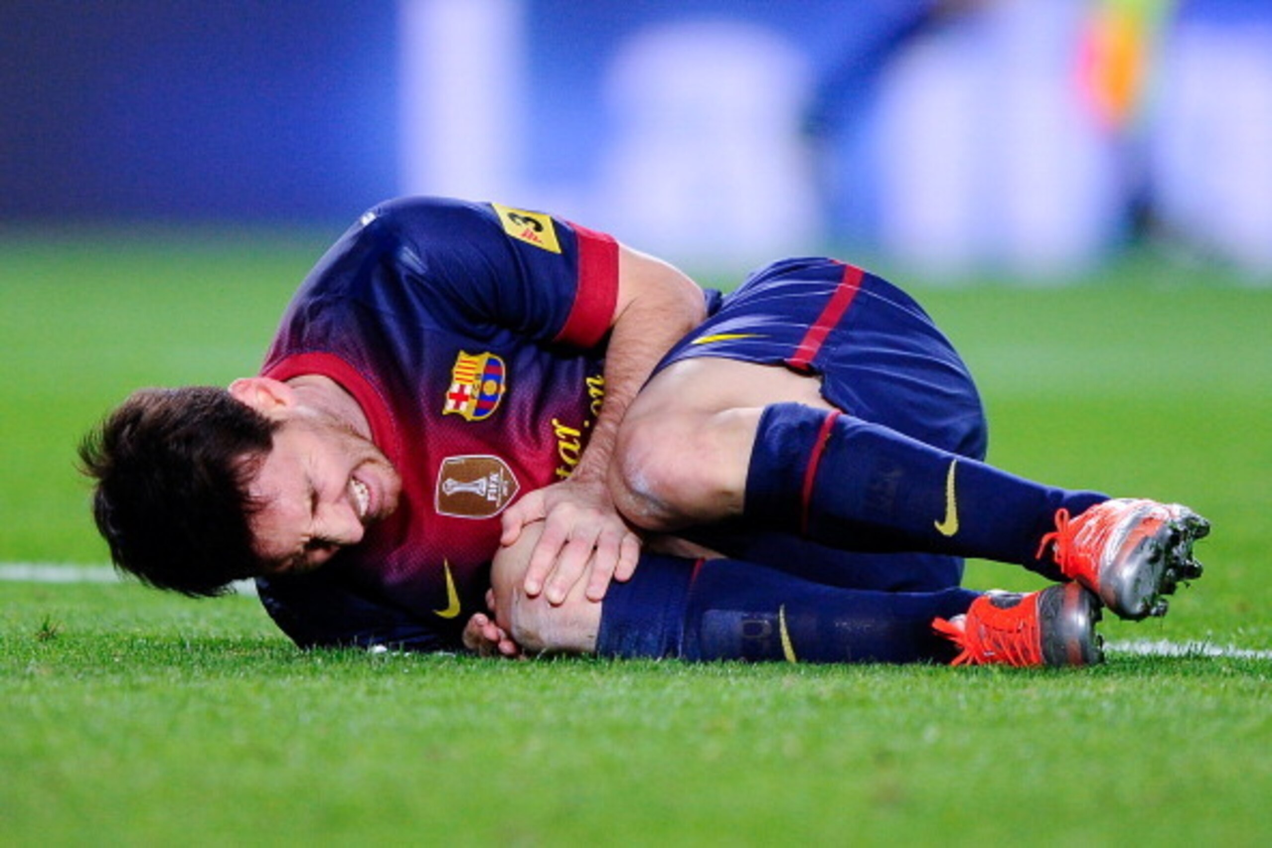 BARCELONA, SPAIN - NOVEMBER 03:  Lionel Messi of FC Barcelona reacts on the picth after being tackled during the La Liga match between FC Barcelona and RC Celta de Vigo at Camp Nou on November 3, 2012 in Barcelona, Spain.  (Photo by David Ramos/Getty Imag