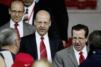MANCHESTER, ENGLAND-AUGUST 9 : (L to R) Joel Glazer, Avram Glazer and Bryan Glazer, sons of owner Malcolm Glazer, are seen before the Champions League third qualifying round, first leg match between Manchester United and Debreceni VSC at Old Trafford on A