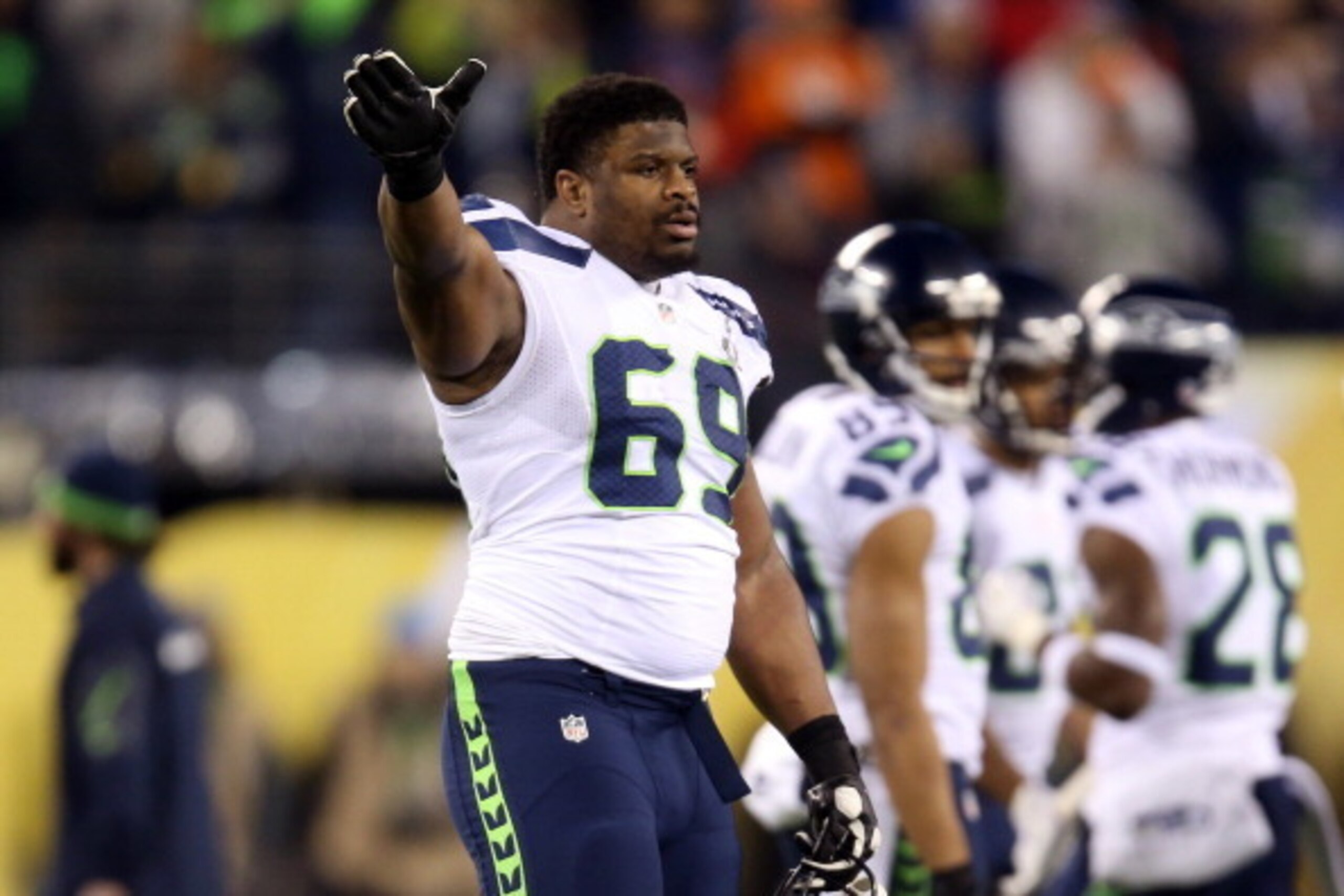 EAST RUTHERFORD, NJ - FEBRUARY 02:  Defensive tackle Clinton McDonald #69 of the Seattle Seahawks reacts in the second quarter against the Denver Broncos during Super Bowl XLVIII at MetLife Stadium on February 2, 2014 in East Rutherford, New Jersey.  (Pho