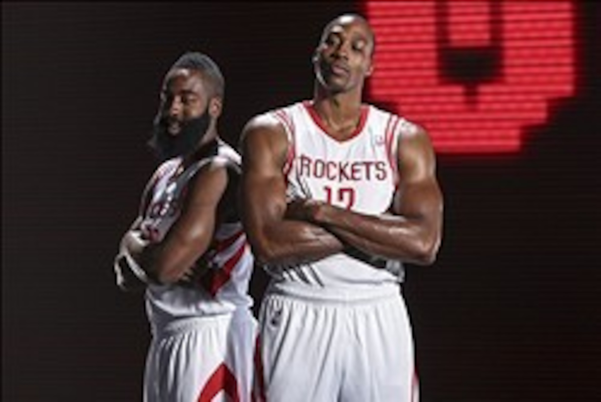 Sep 27, 2013; Houston, TX, USA;  Houston Rockets shooting guard James Harden (13) and center Dwight Howard (12) pose for a picture during media day at Toyota Center. Mandatory Credit: Troy Taormina-USA TODAY Sports